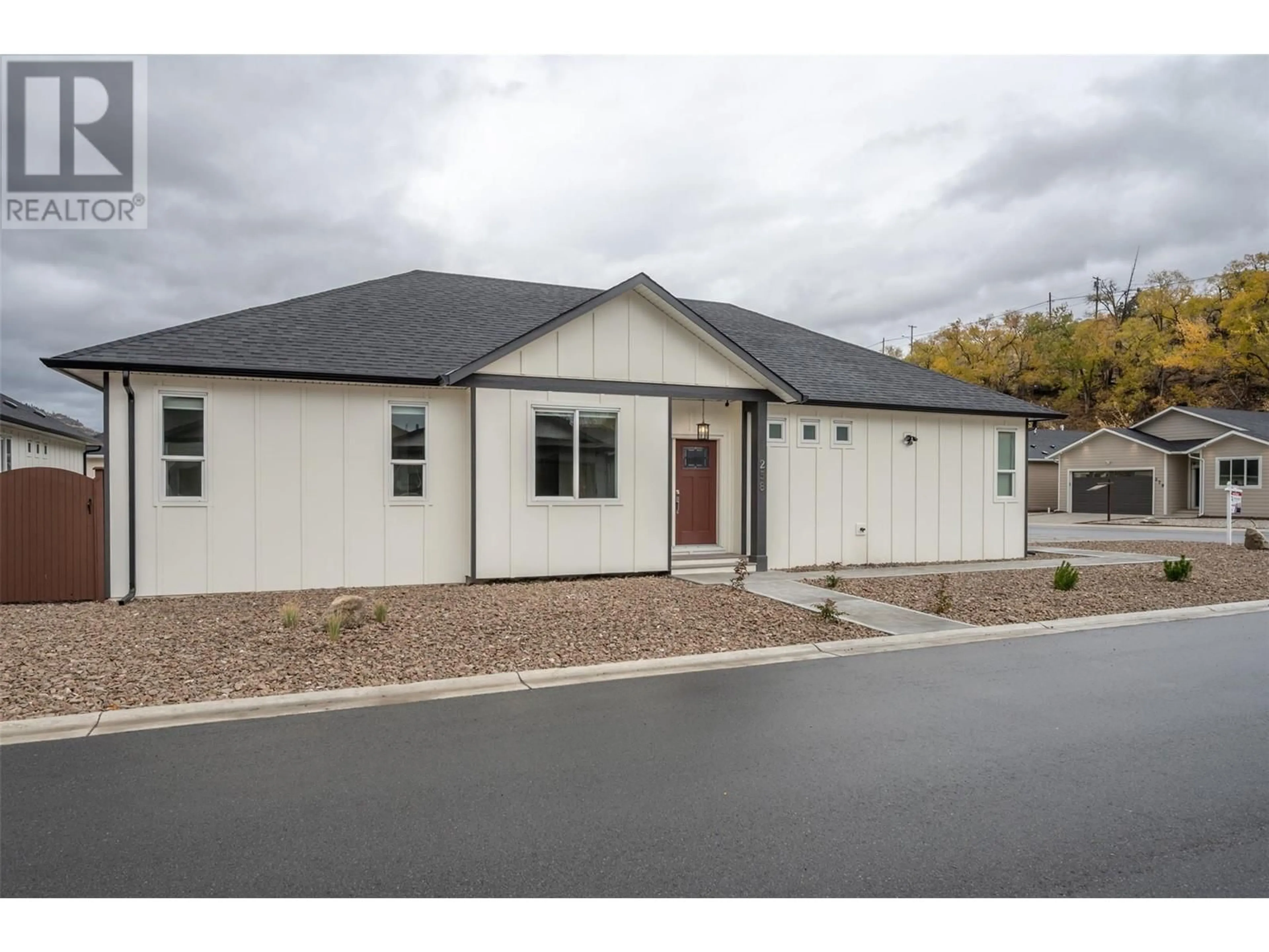 Home with vinyl exterior material, street for 258 BENTGRASS AVENUE, Oliver British Columbia V0H1T3