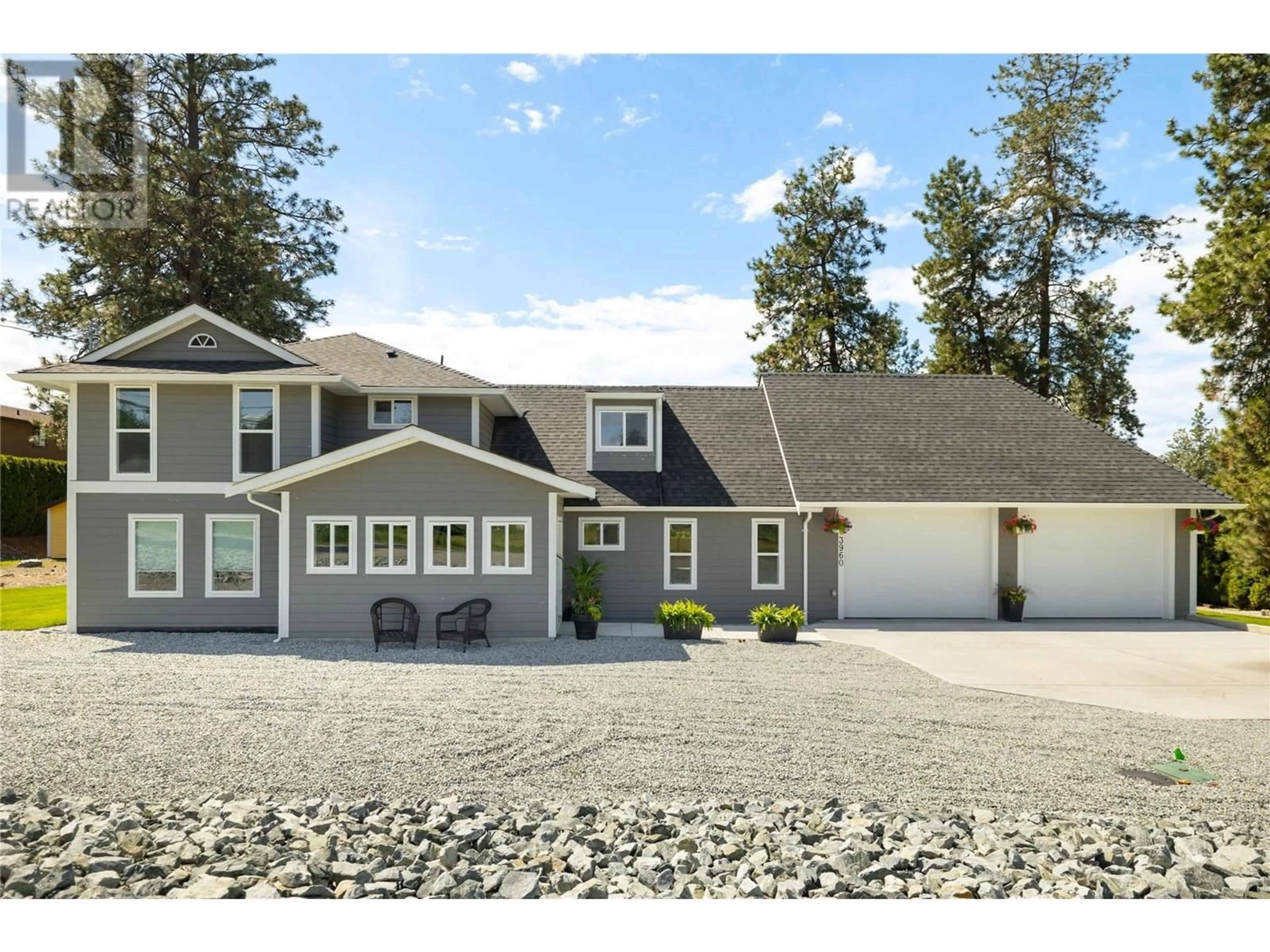 Home with vinyl exterior material, mountain view for 3960 JUNE SPRINGS ROAD, Kelowna British Columbia V1W4E4