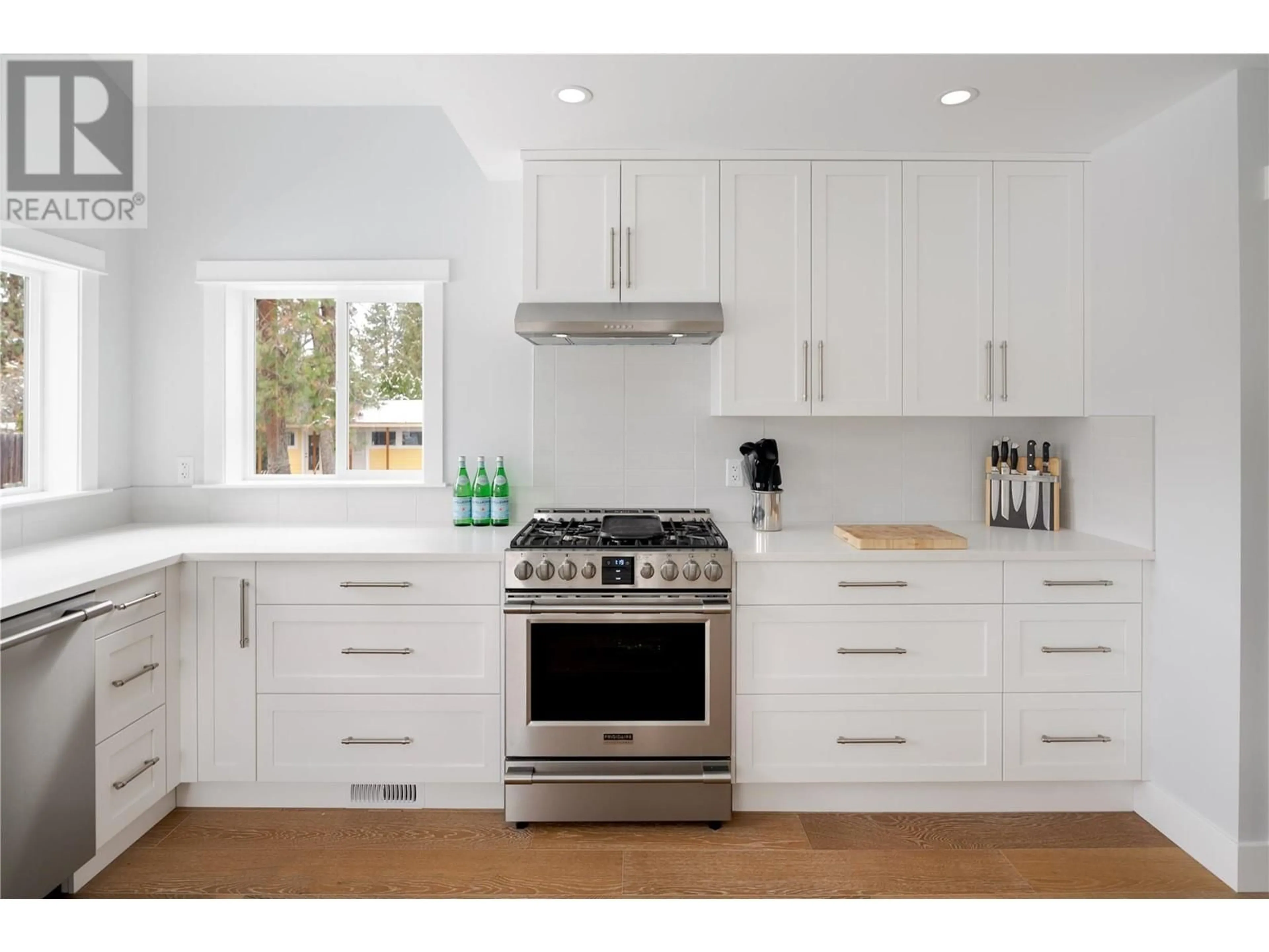 Contemporary kitchen, wood/laminate floor for 3960 JUNE SPRINGS ROAD, Kelowna British Columbia V1W4E4