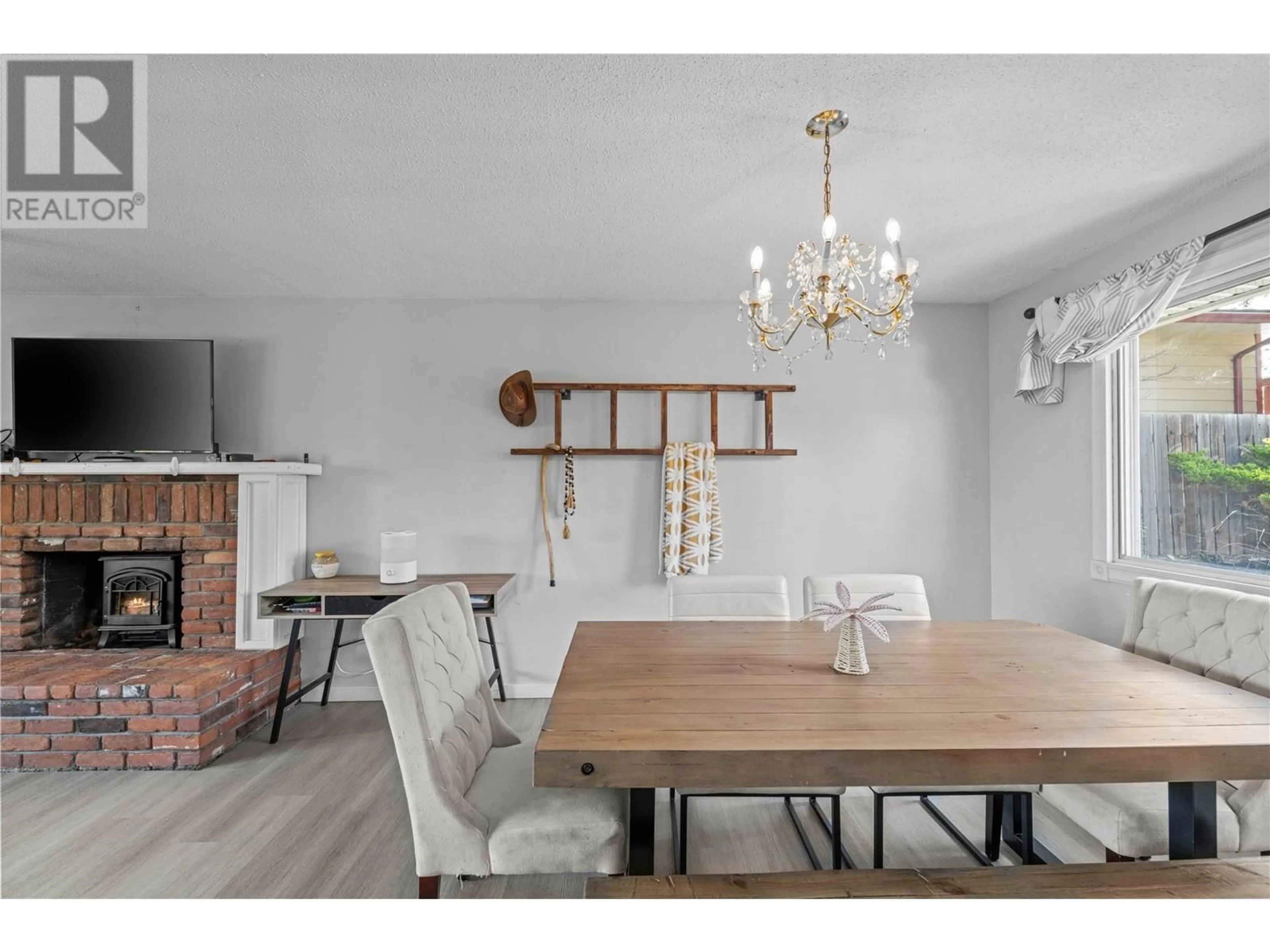 Dining room, wood/laminate floor for 787 GLENEAGLES DRIVE, Kamloops British Columbia V2E1J7