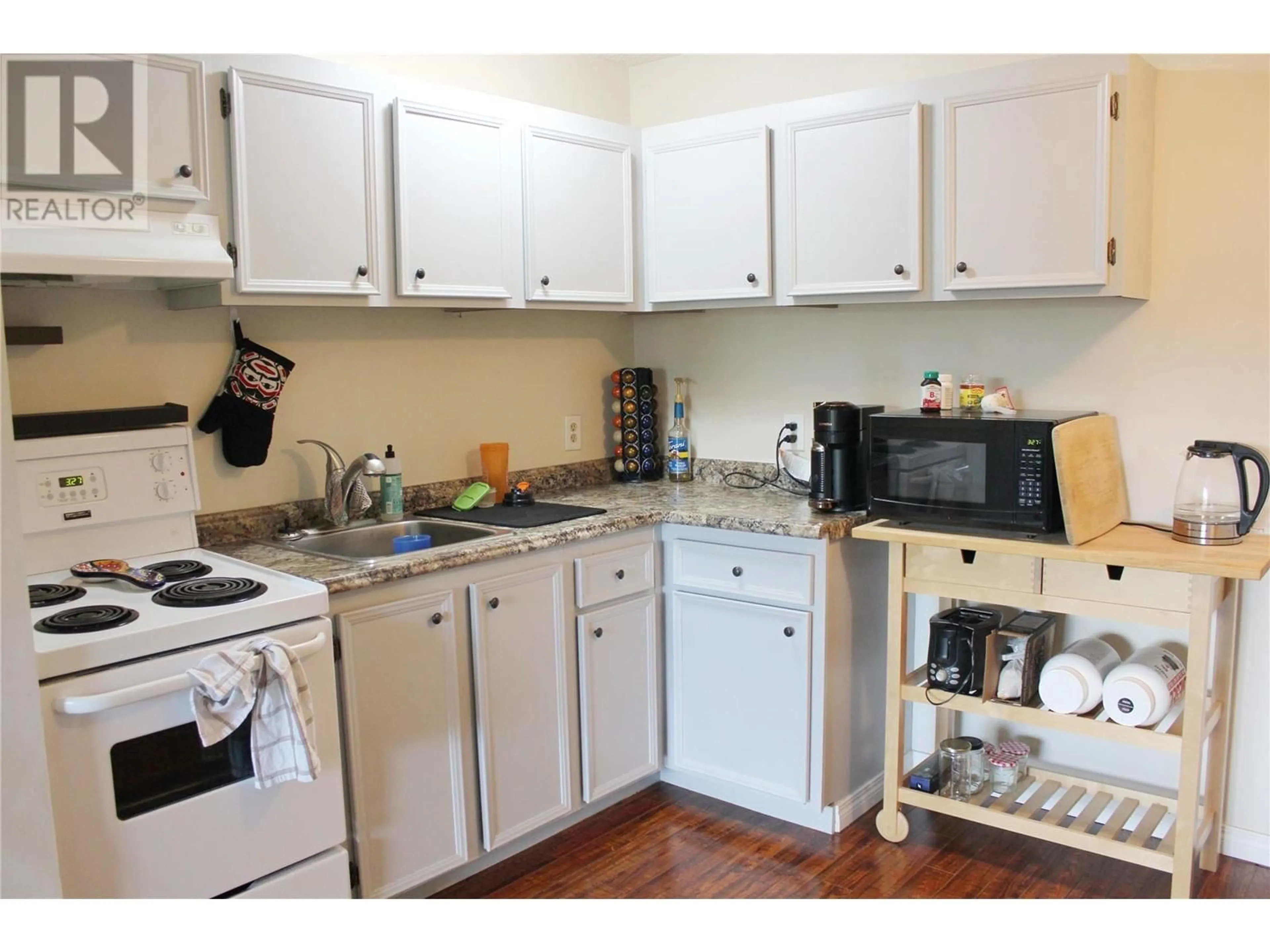 Standard kitchen, wood/laminate floor for 307 - 130 SKAHA PLACE, Penticton British Columbia V2A7L1
