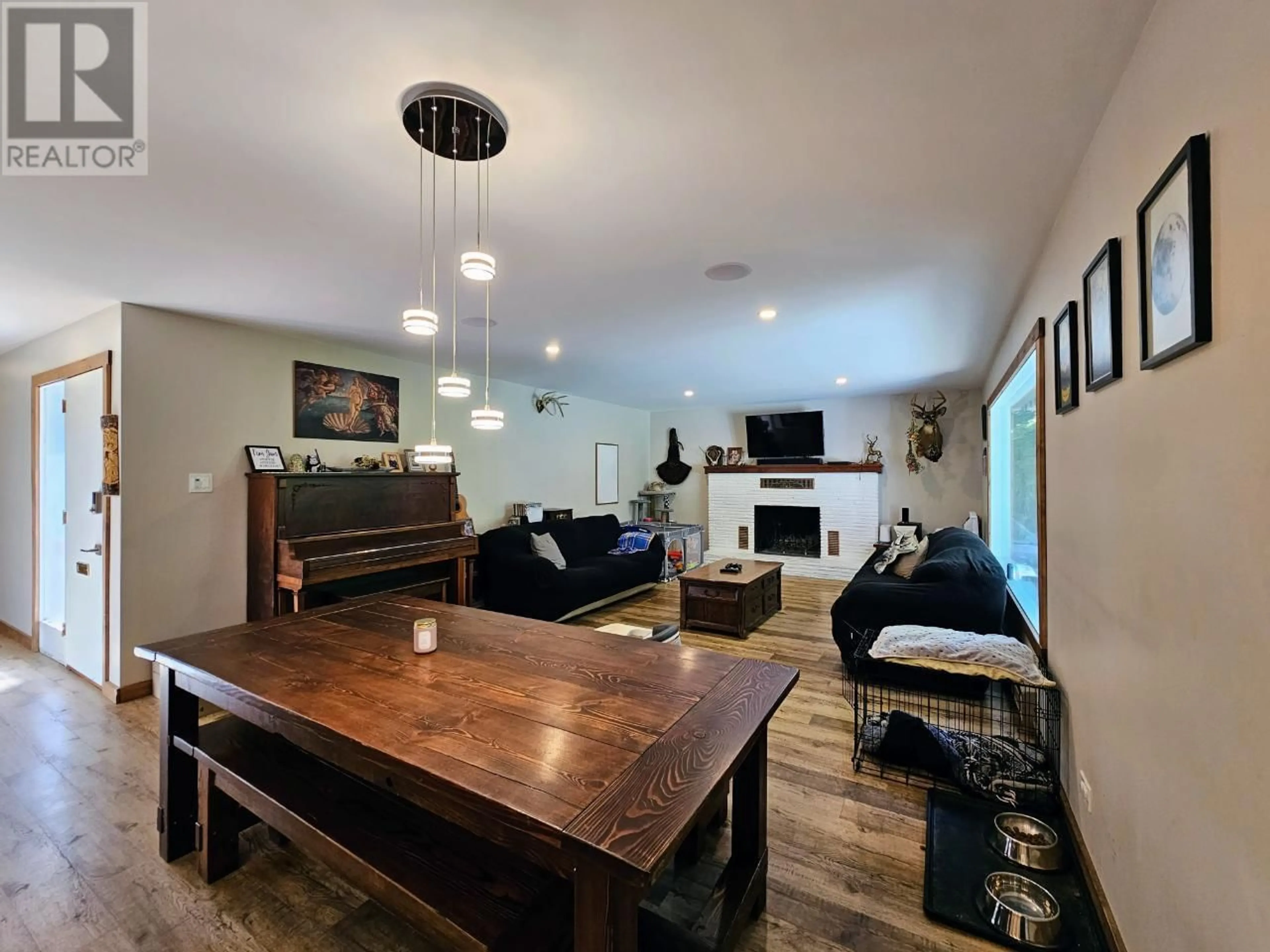 Living room with furniture, wood/laminate floor for 111 DELBRUCK STREET, Nelson British Columbia V1L5K9