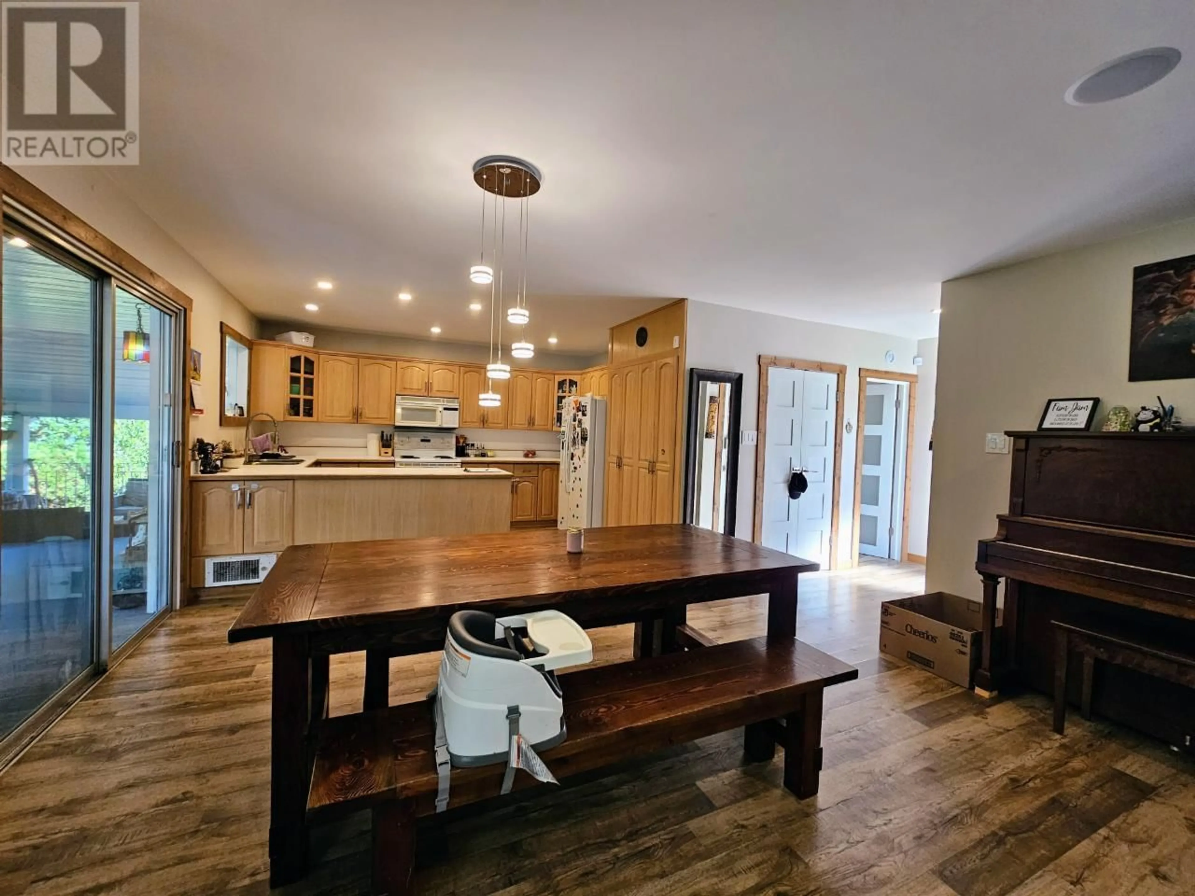 Open concept kitchen, wood/laminate floor for 111 DELBRUCK STREET, Nelson British Columbia V1L5K9