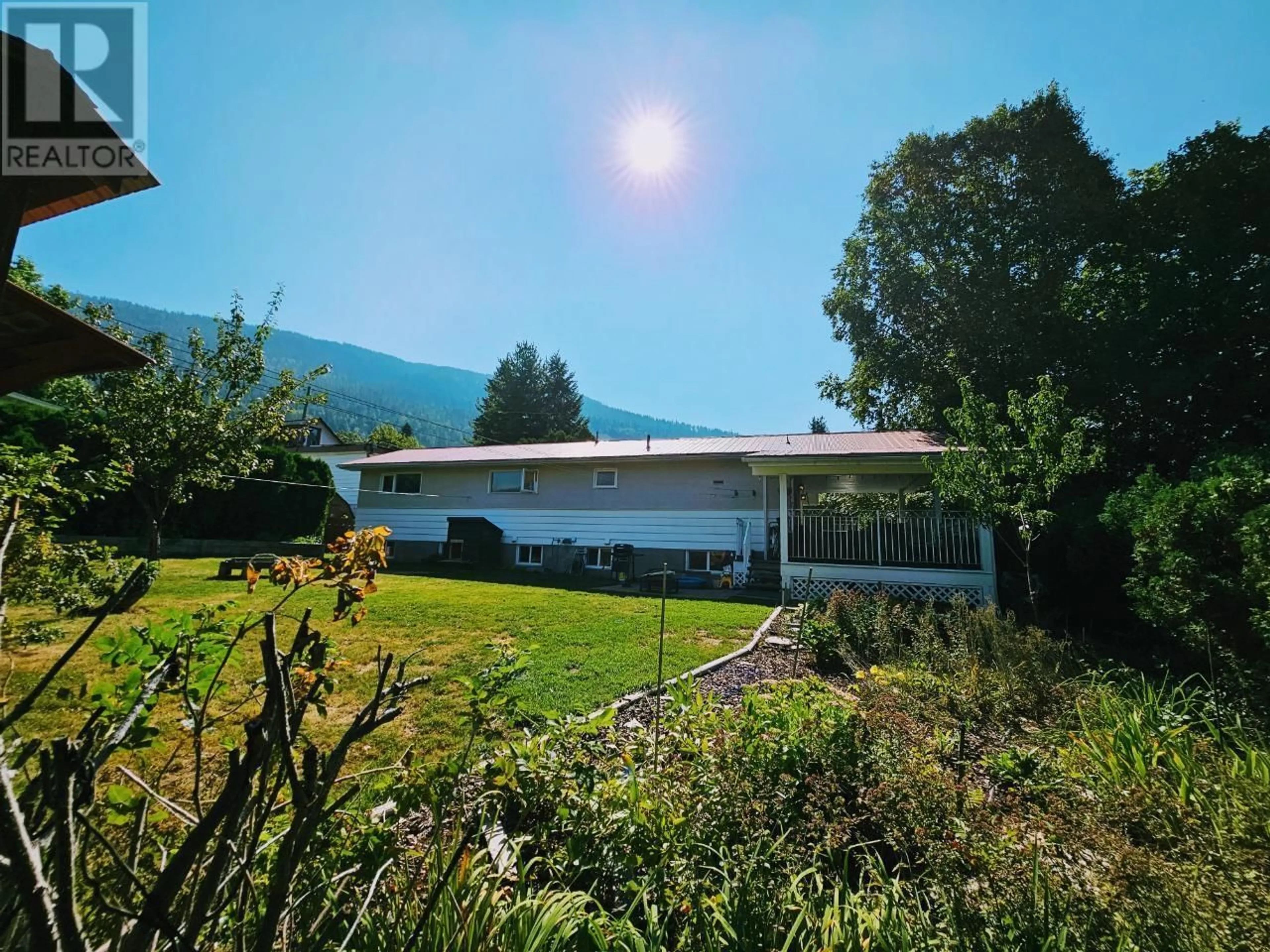 A pic from outside/outdoor area/front of a property/back of a property/a pic from drone, mountain view for 111 DELBRUCK STREET, Nelson British Columbia V1L5K9