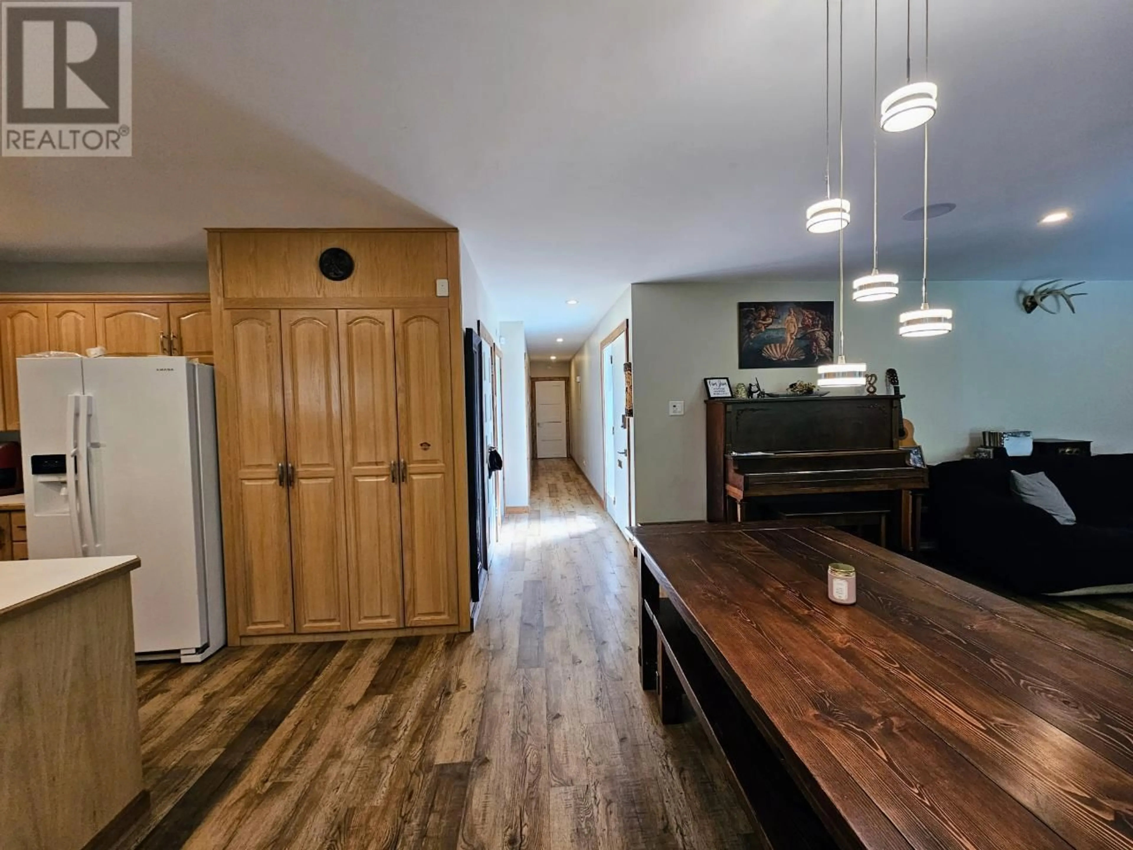 Open concept kitchen, wood/laminate floor for 111 DELBRUCK STREET, Nelson British Columbia V1L5K9