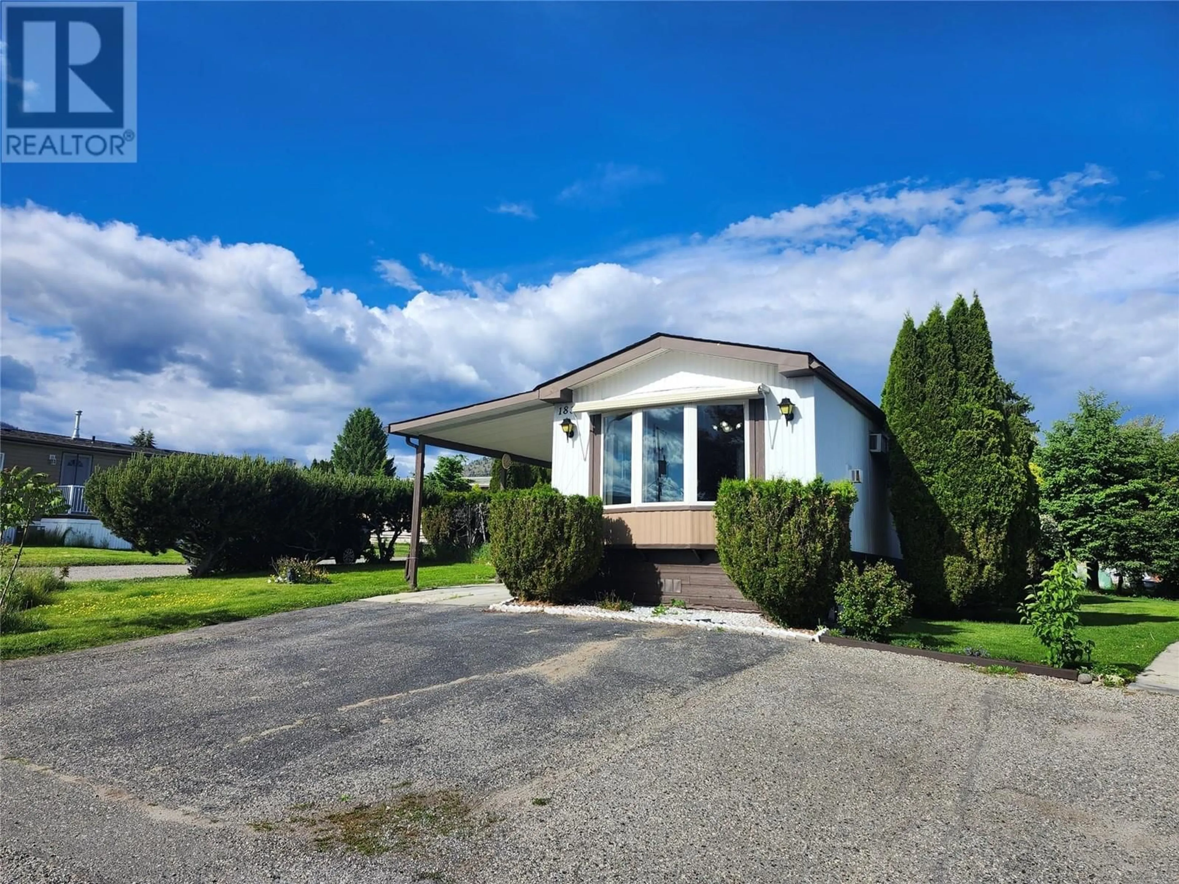 A pic from outside/outdoor area/front of a property/back of a property/a pic from drone, street for 183 - 1880 OLD BOUCHERIE ROAD, West Kelowna British Columbia V4T1Z2