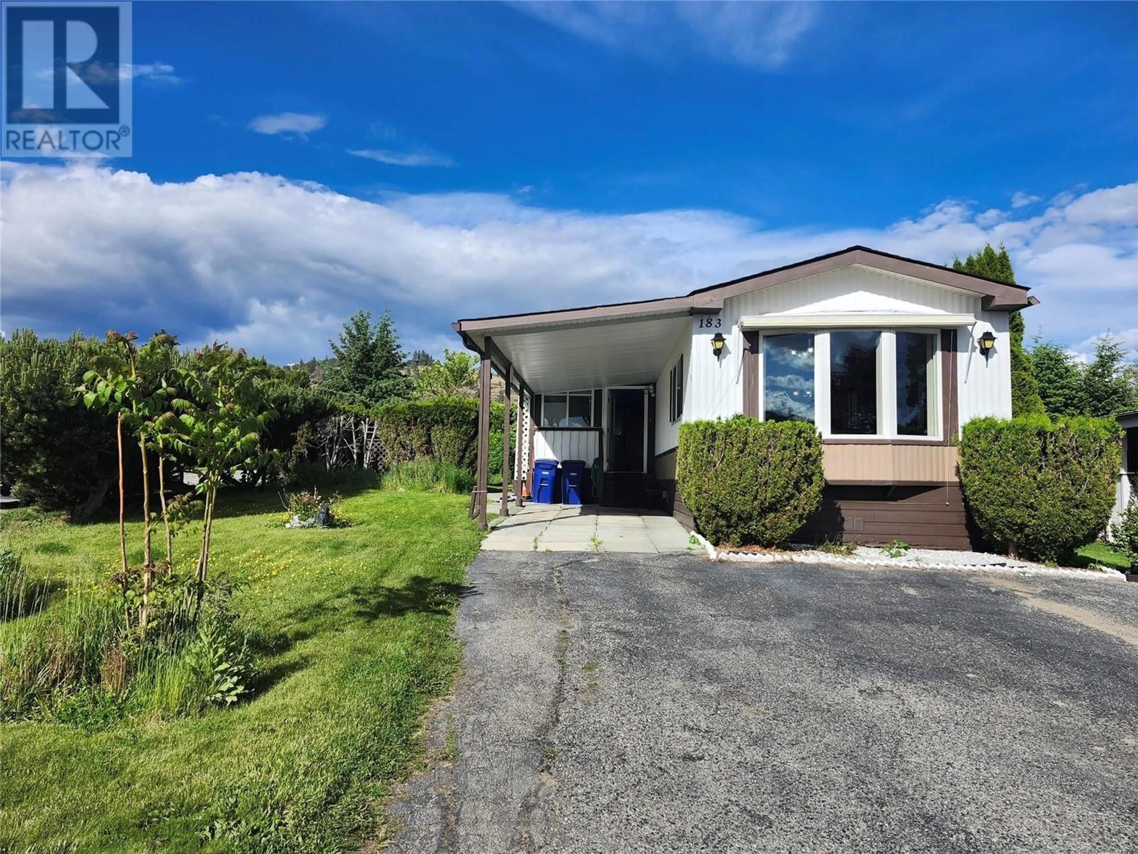A pic from outside/outdoor area/front of a property/back of a property/a pic from drone, street for 183 - 1880 OLD BOUCHERIE ROAD, West Kelowna British Columbia V4T1Z2