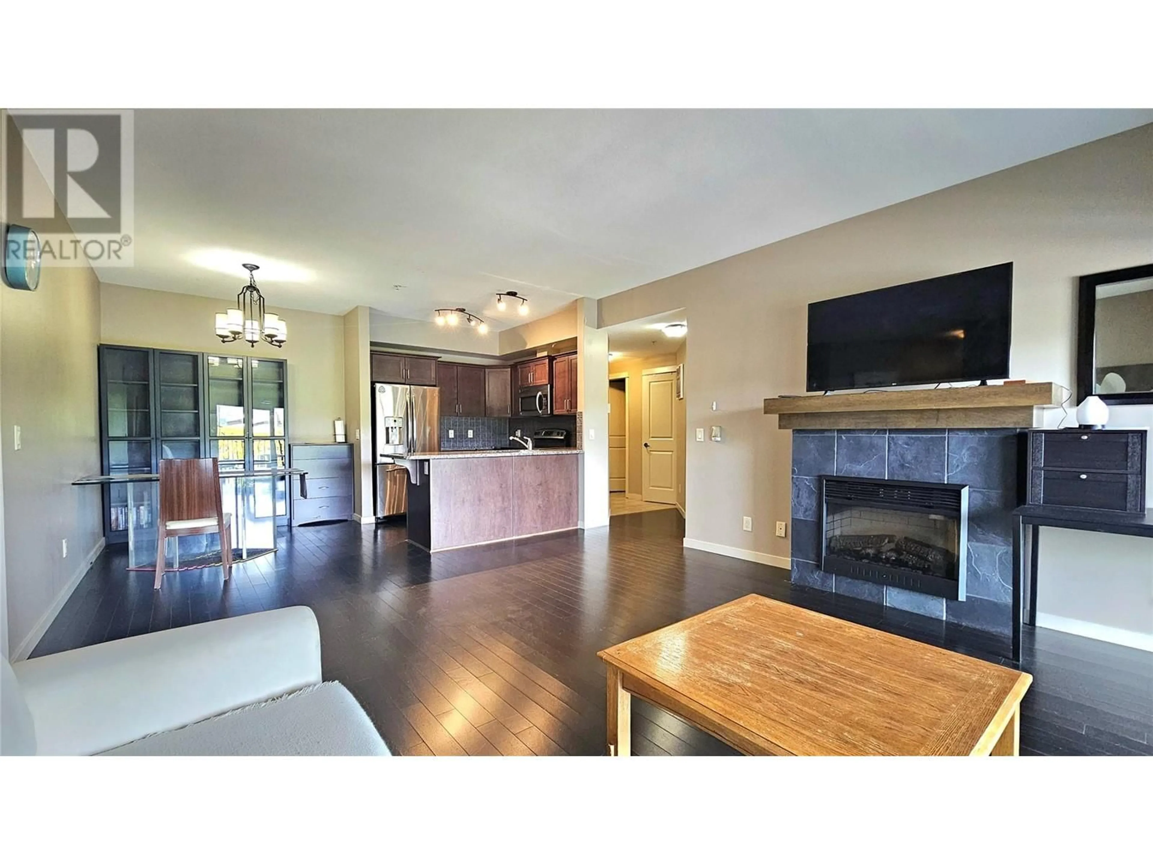 Open concept kitchen, wood/laminate floor for 314 - 2142 VASILE ROAD, Kelowna British Columbia V1Y6H5