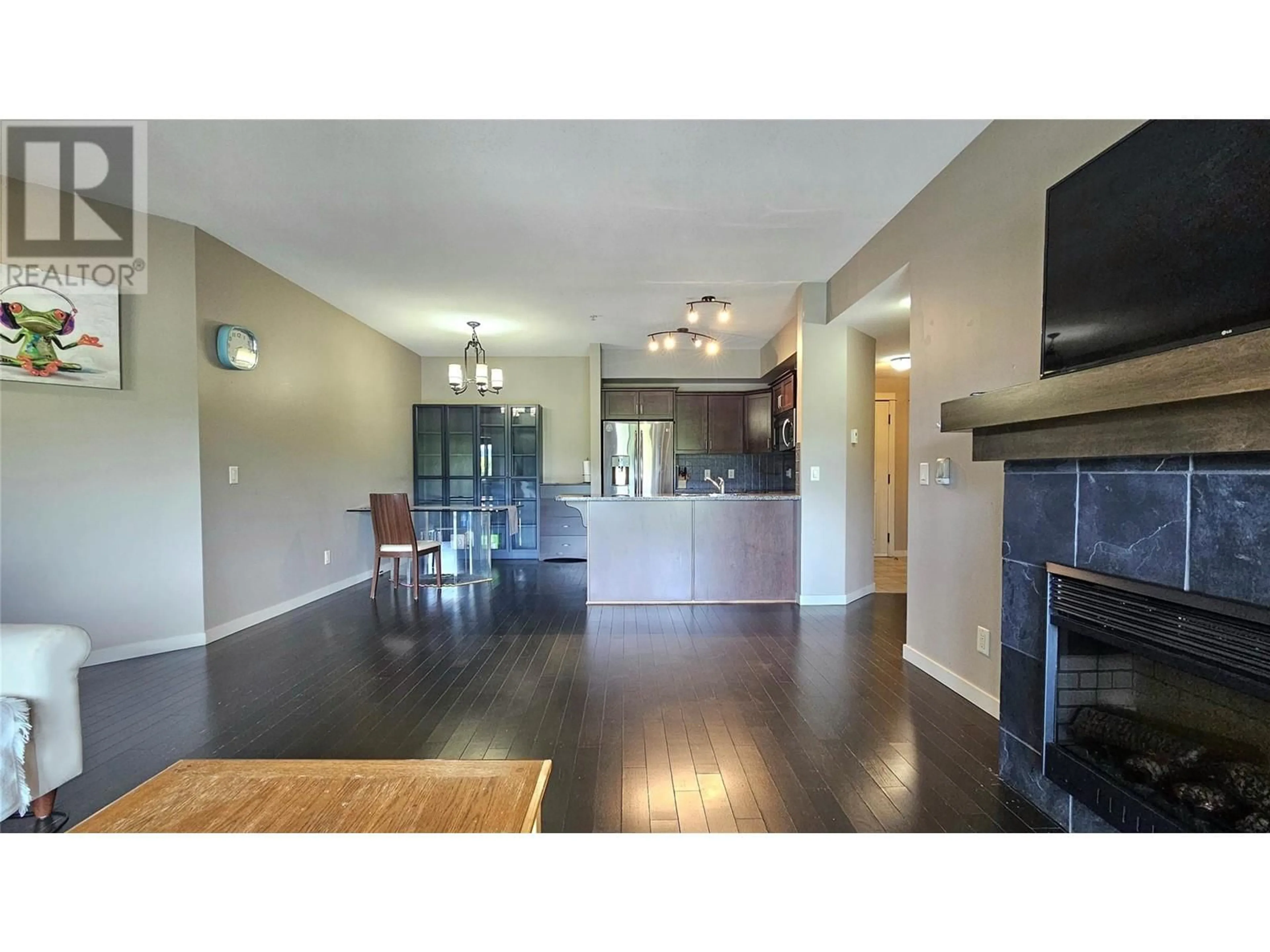 Open concept kitchen, wood/laminate floor for 314 - 2142 VASILE ROAD, Kelowna British Columbia V1Y6H5
