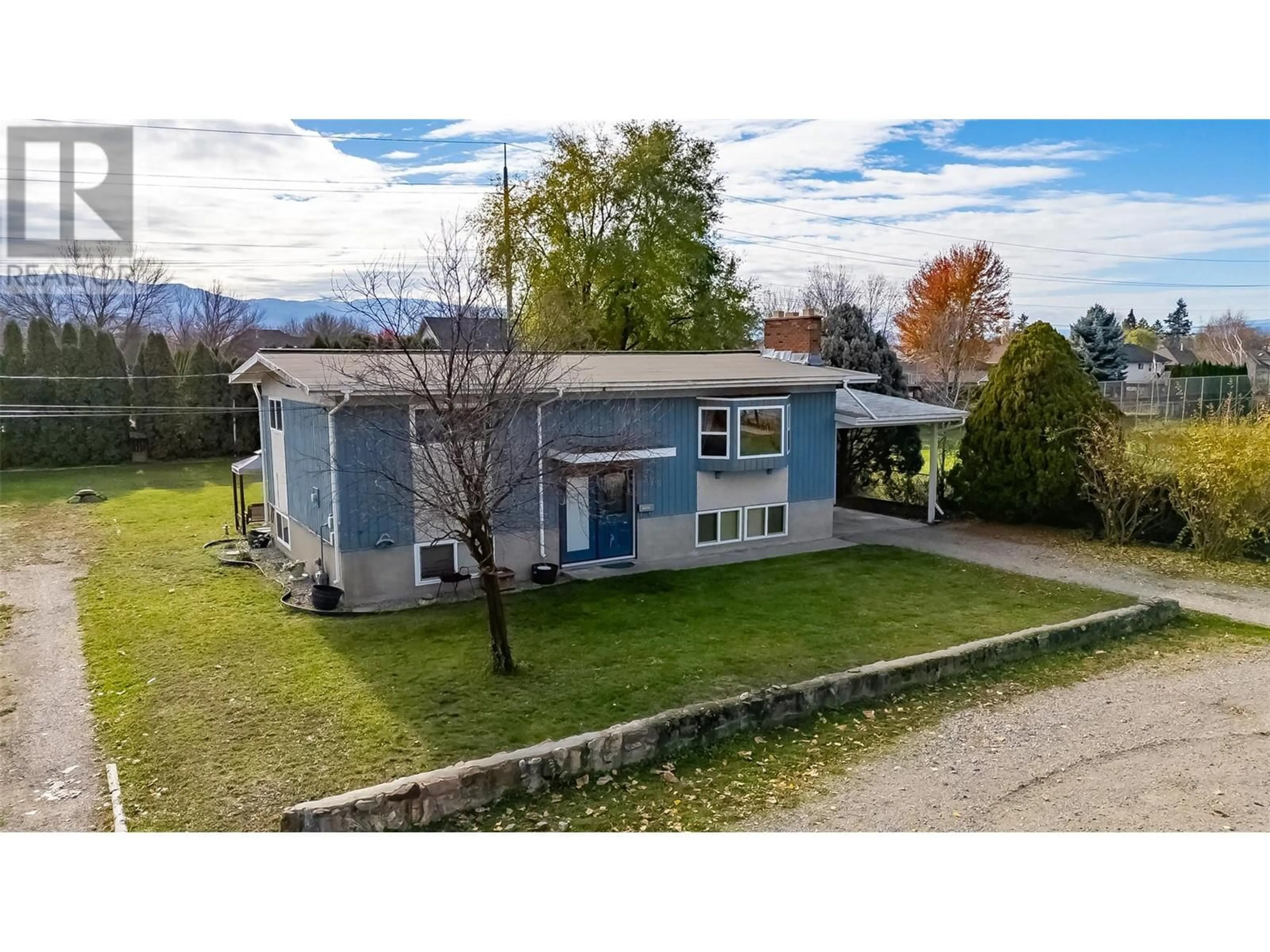 A pic from outside/outdoor area/front of a property/back of a property/a pic from drone, mountain view for 375 EDITH GAY ROAD, Kelowna British Columbia V1X4S5