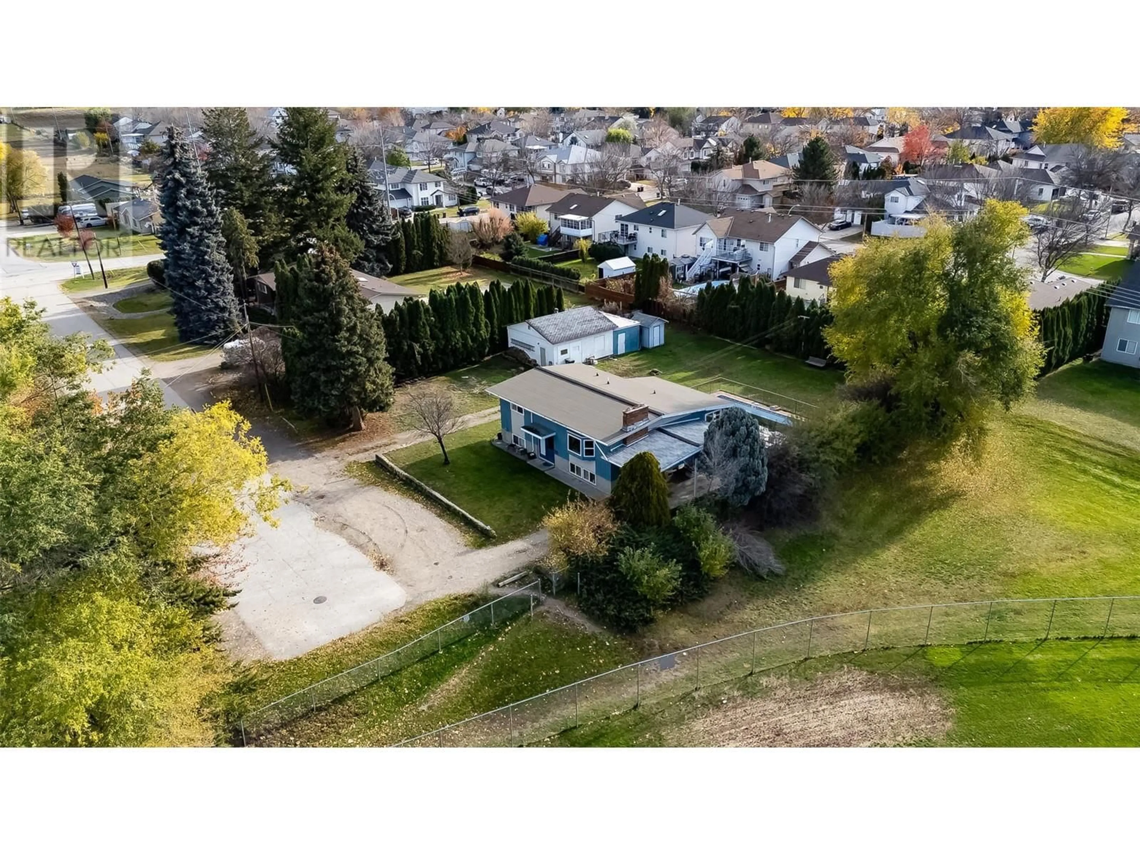 A pic from outside/outdoor area/front of a property/back of a property/a pic from drone, street for 375 EDITH GAY ROAD, Kelowna British Columbia V1X4S5