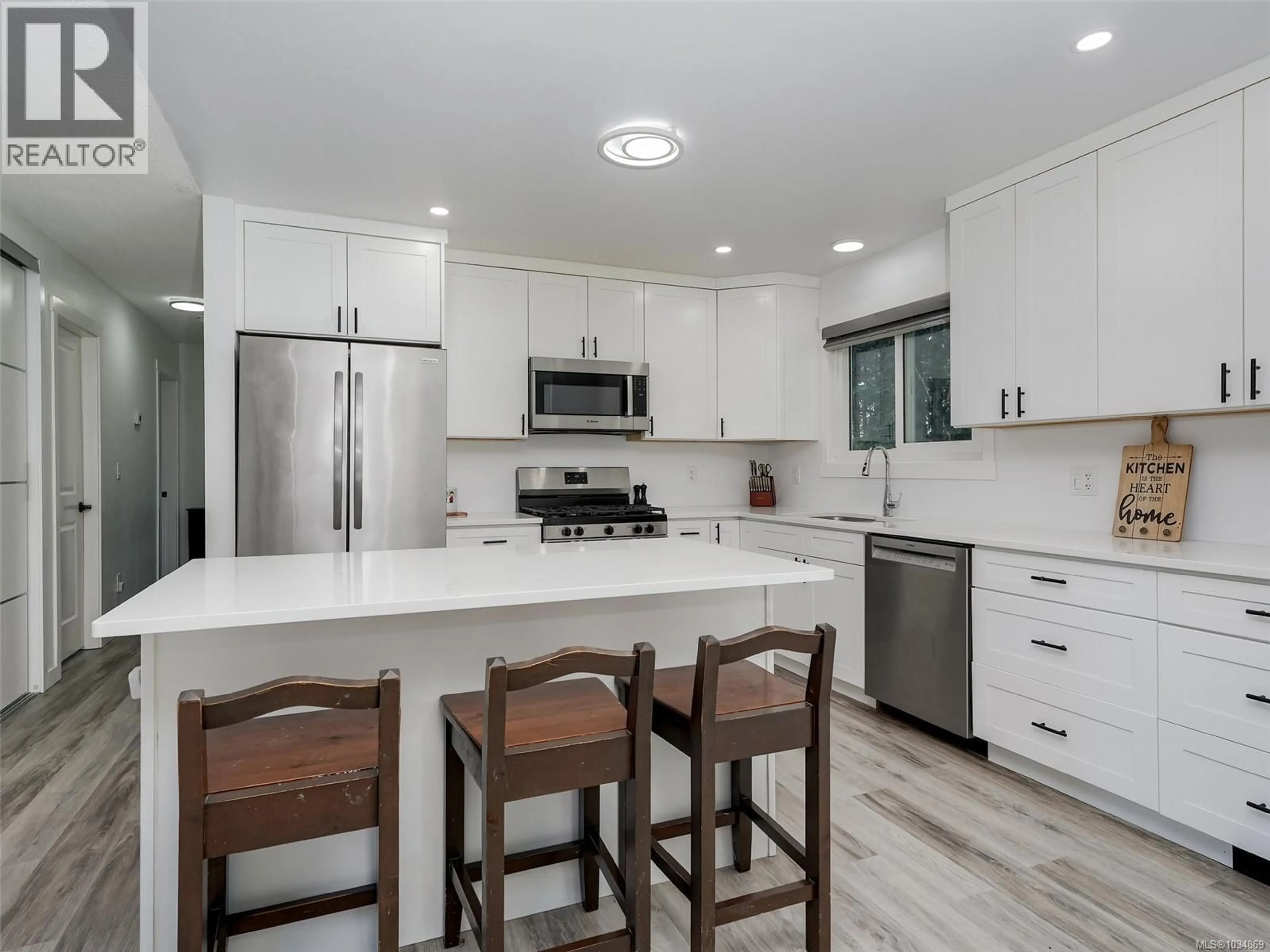 Open concept kitchen, ceramic/tile floor for 435 DRESSLER ROAD, Colwood British Columbia V9C2W6