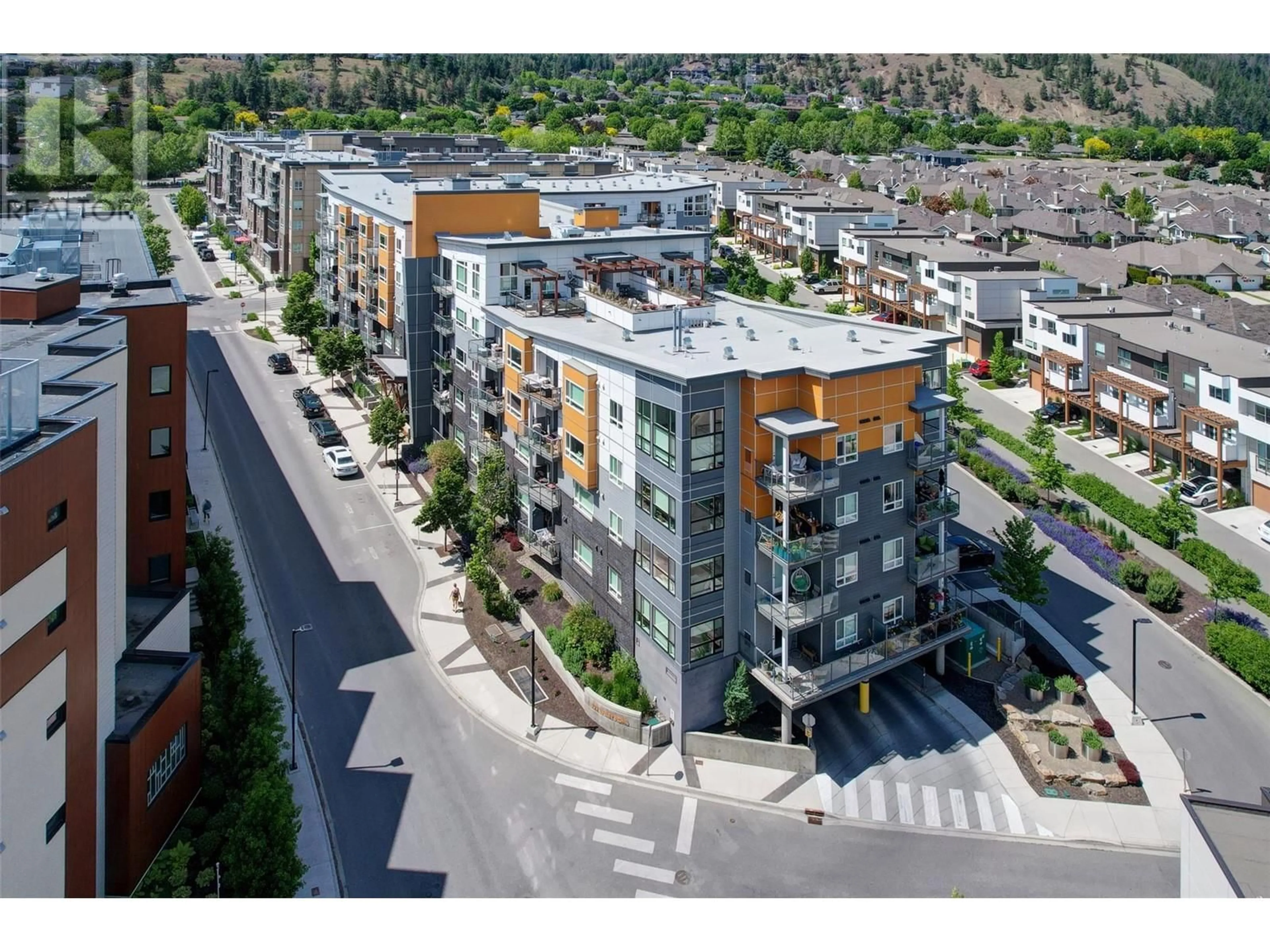 A pic from outside/outdoor area/front of a property/back of a property/a pic from drone, street for 406 - 722 VALLEY ROAD, Kelowna British Columbia V1V2E6