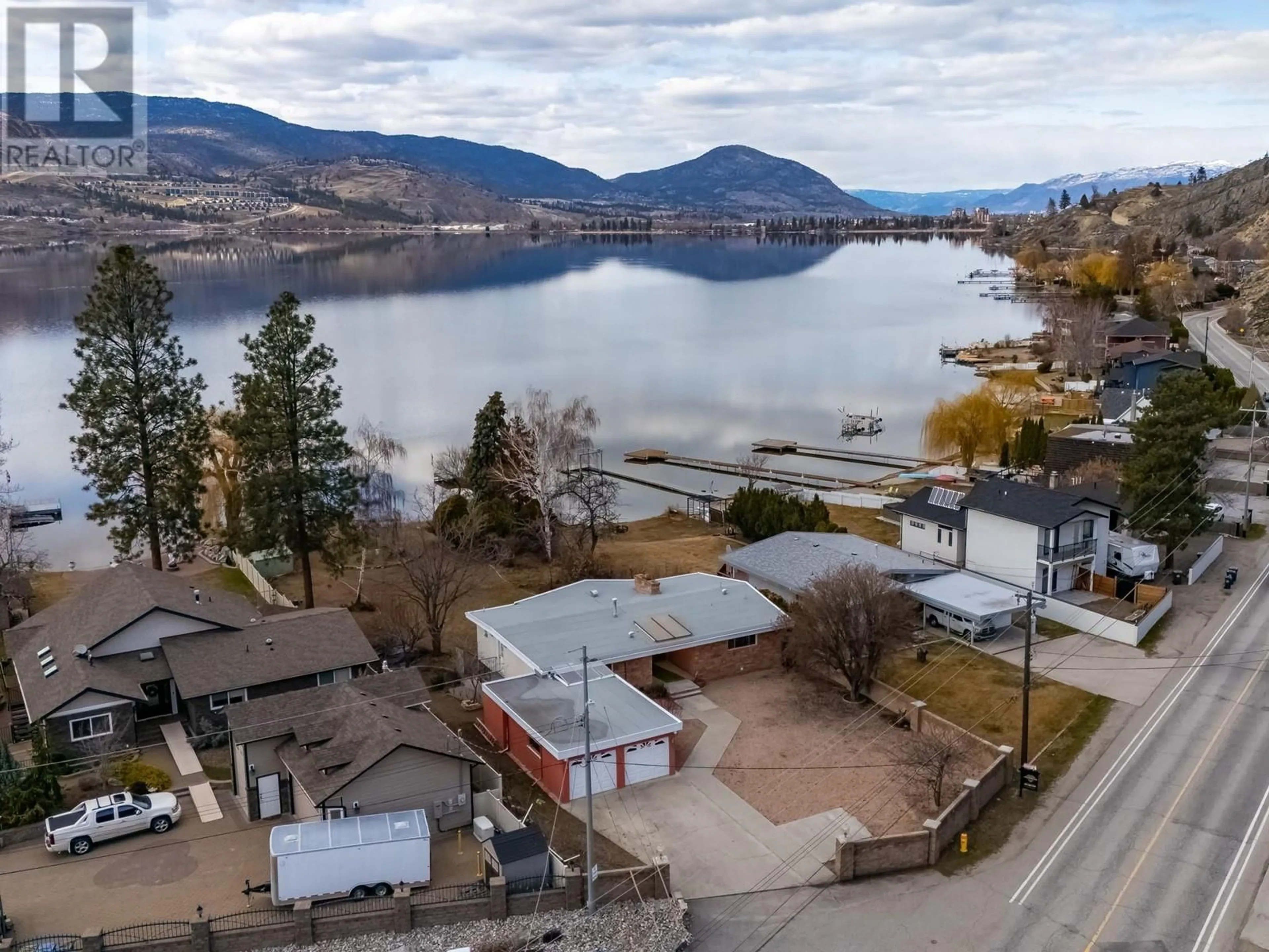 A pic from outside/outdoor area/front of a property/back of a property/a pic from drone, water/lake/river/ocean view for 102 DERENZY PLACE, Penticton British Columbia V2A8W7