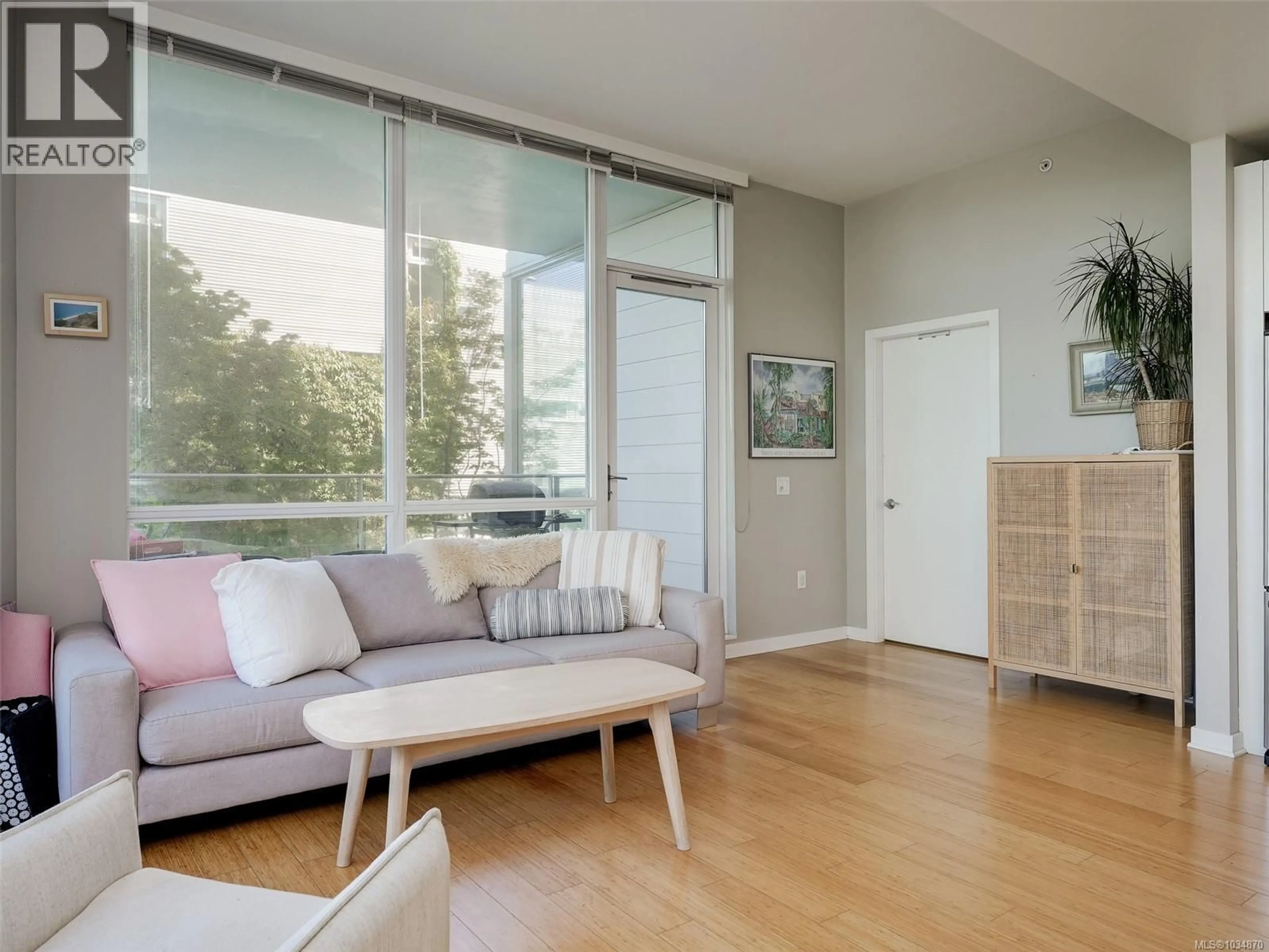 Living room with furniture, unknown for 105 - 399 TYEE ROAD, Victoria British Columbia V9A0A8