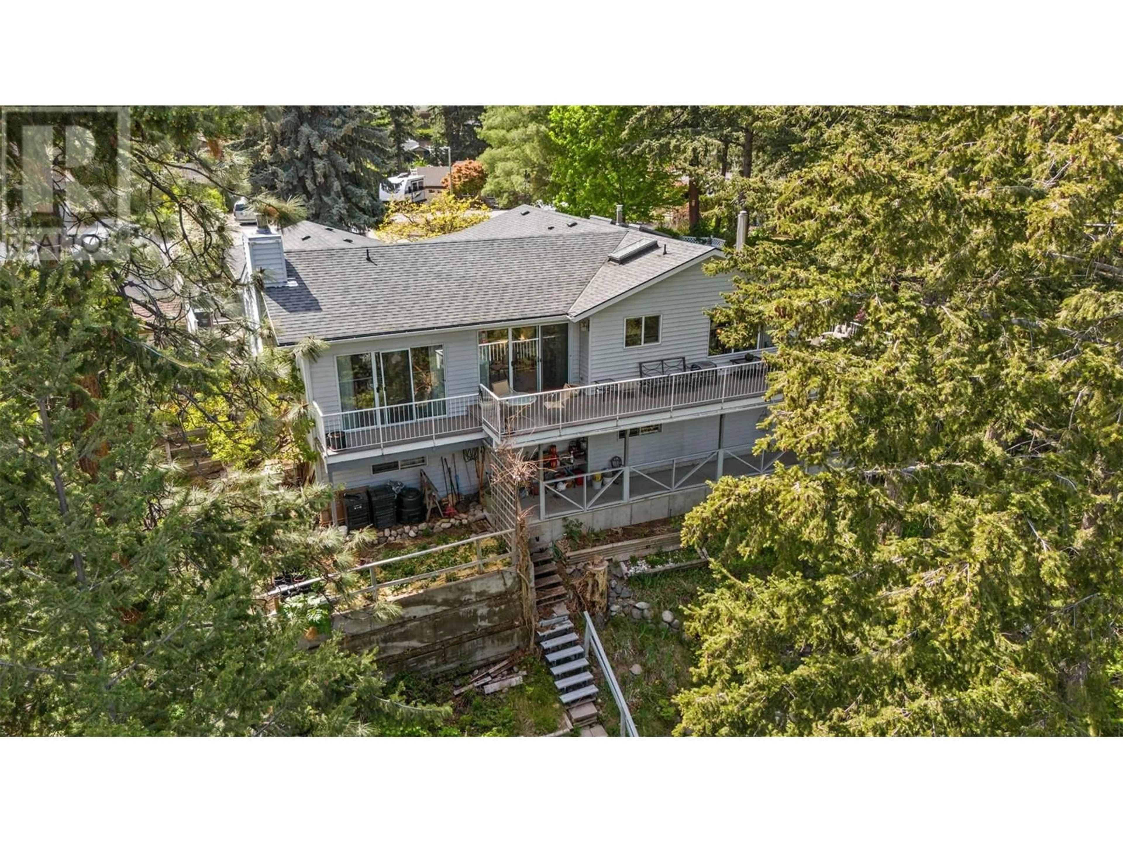 A pic from outside/outdoor area/front of a property/back of a property/a pic from drone, forest/trees view for 3459 PARKVIEW COURT, West Kelowna British Columbia V4T1B9