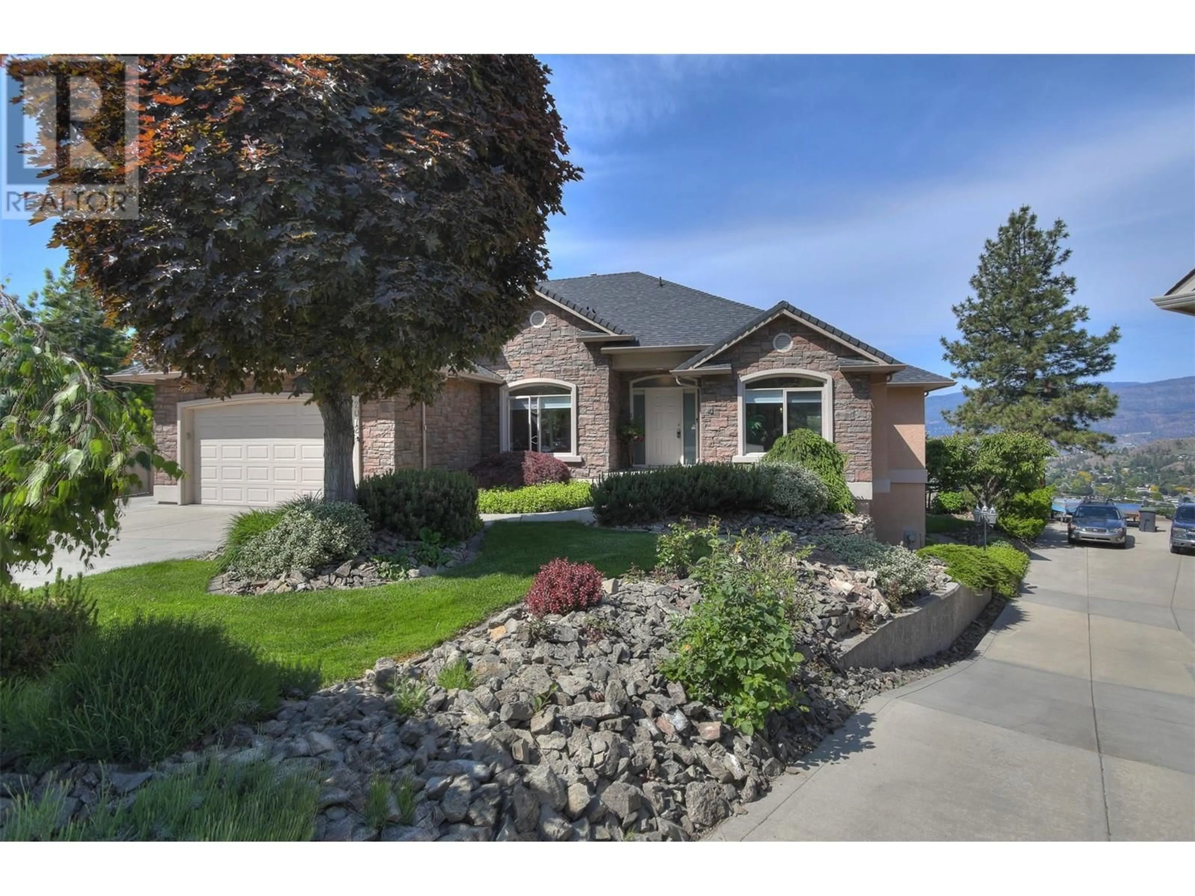 Home with brick exterior material, street for 2072 LILLOOET COURT, Kelowna British Columbia V1Y1V2