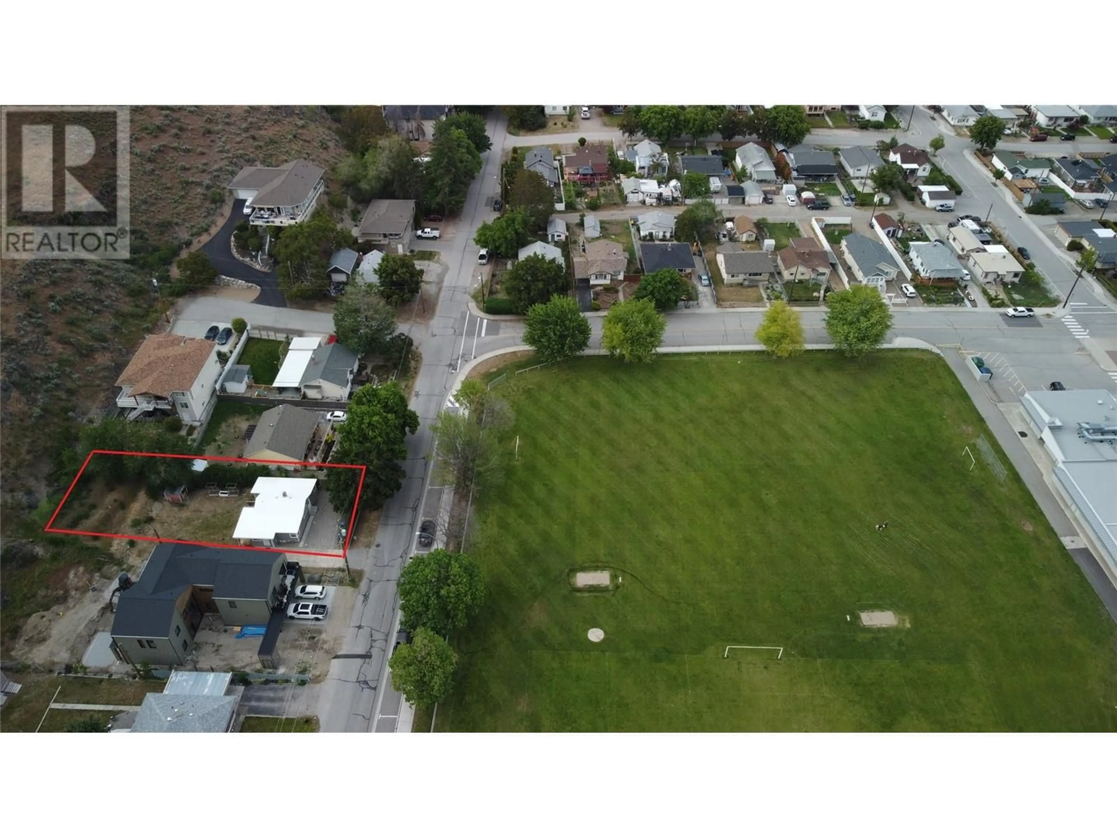 A pic from outside/outdoor area/front of a property/back of a property/a pic from drone, street for 6176 SPARTAN STREET, Oliver British Columbia V0H1T6