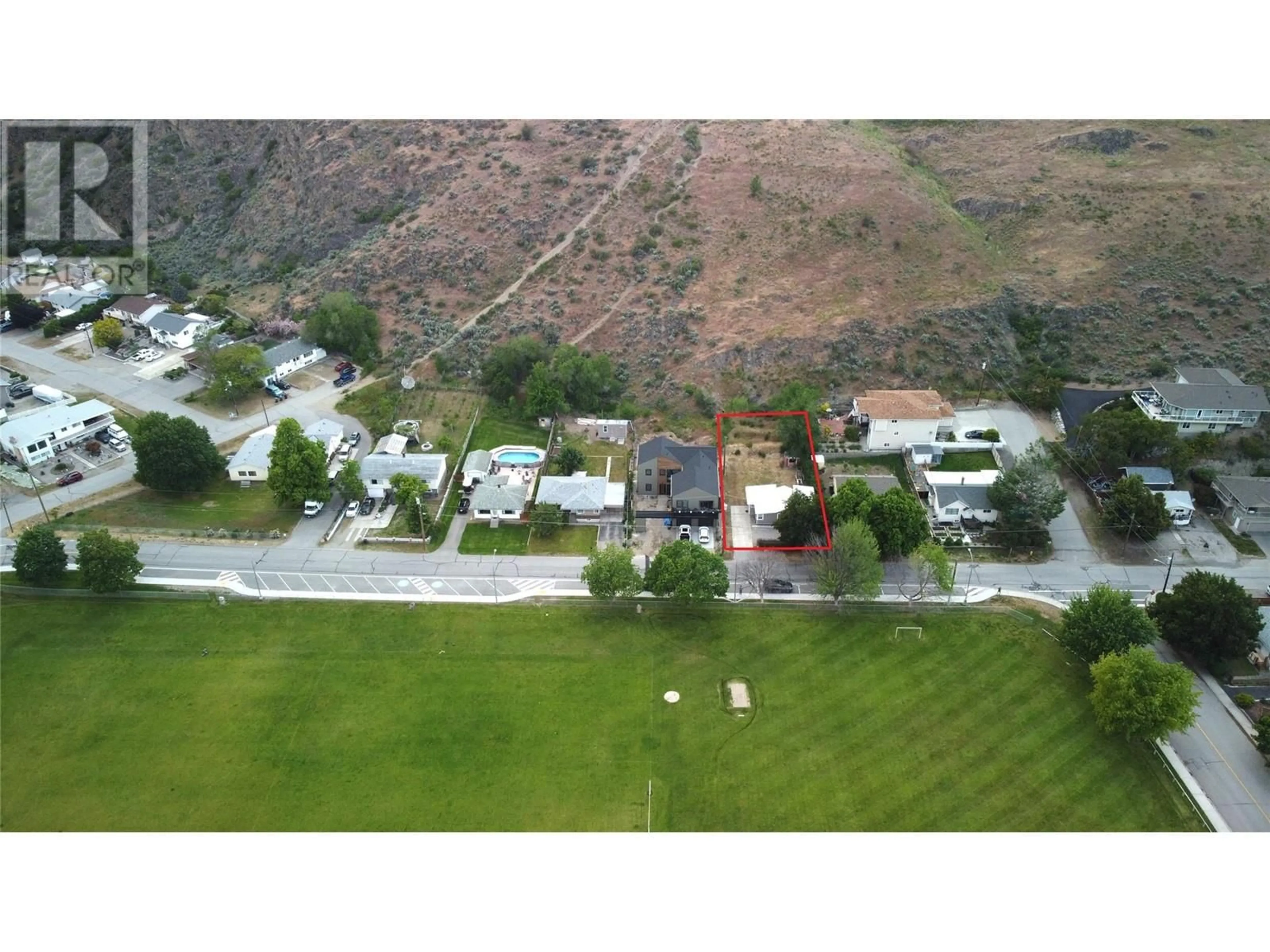 A pic from outside/outdoor area/front of a property/back of a property/a pic from drone, mountain view for 6176 SPARTAN STREET, Oliver British Columbia V0H1T6