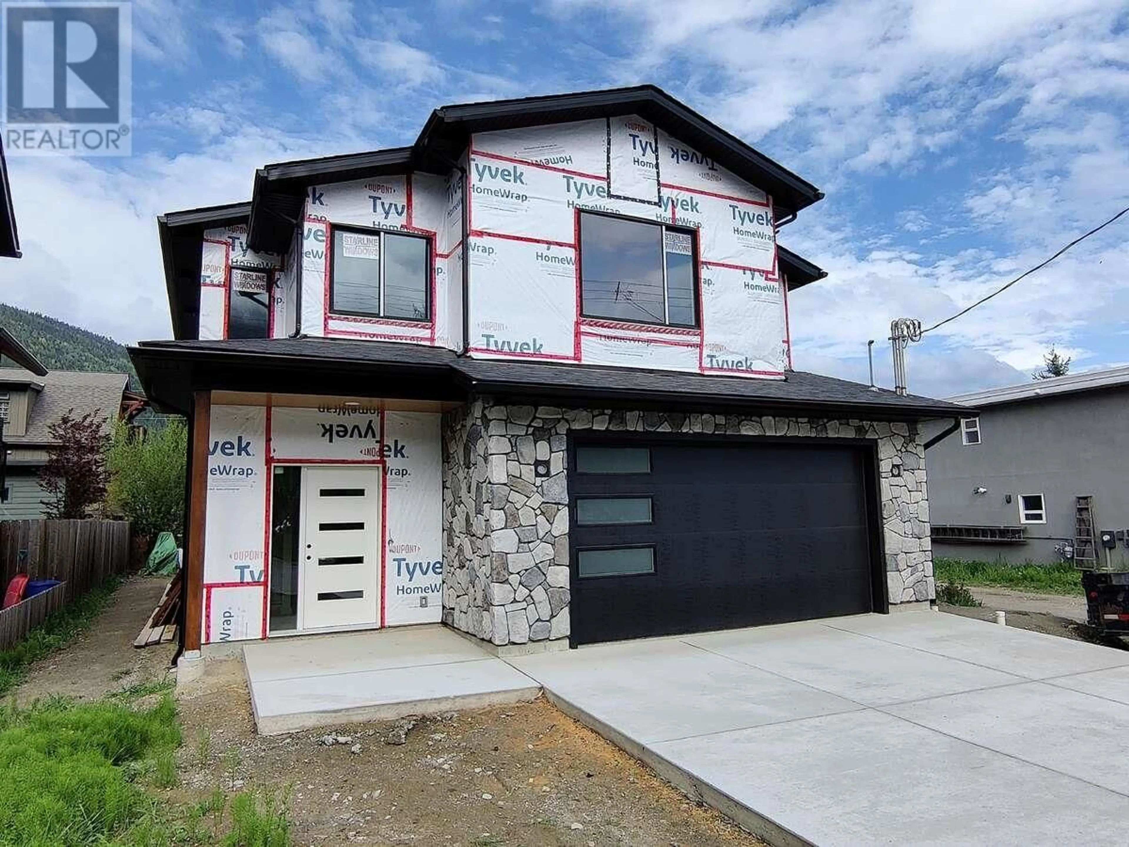 Home with vinyl exterior material, street for 1906 SILVER KING ROAD, Nelson British Columbia V1L1C7