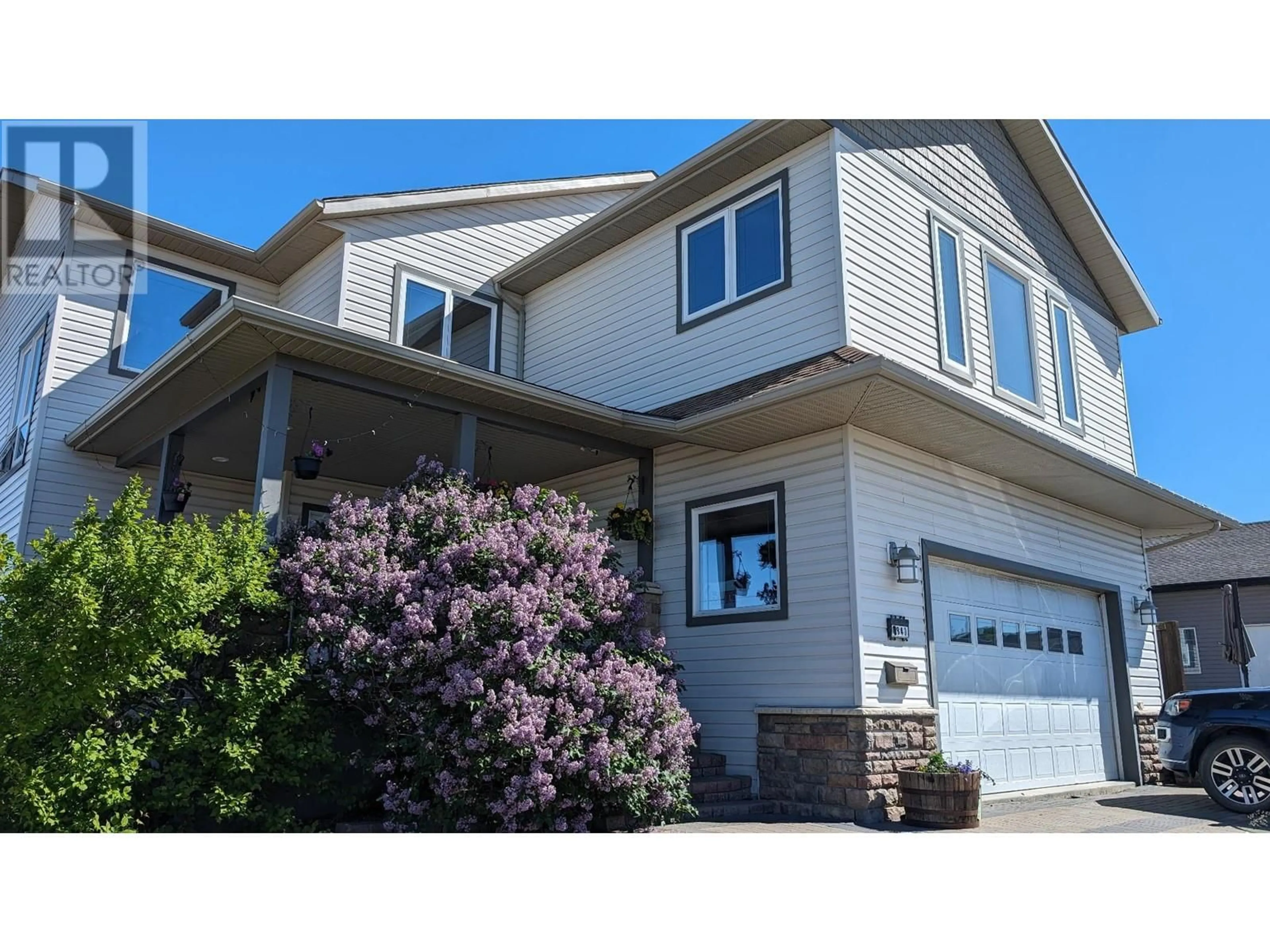 Home with vinyl exterior material, street for 1844 88 AVENUE, Dawson Creek British Columbia V1G0A6