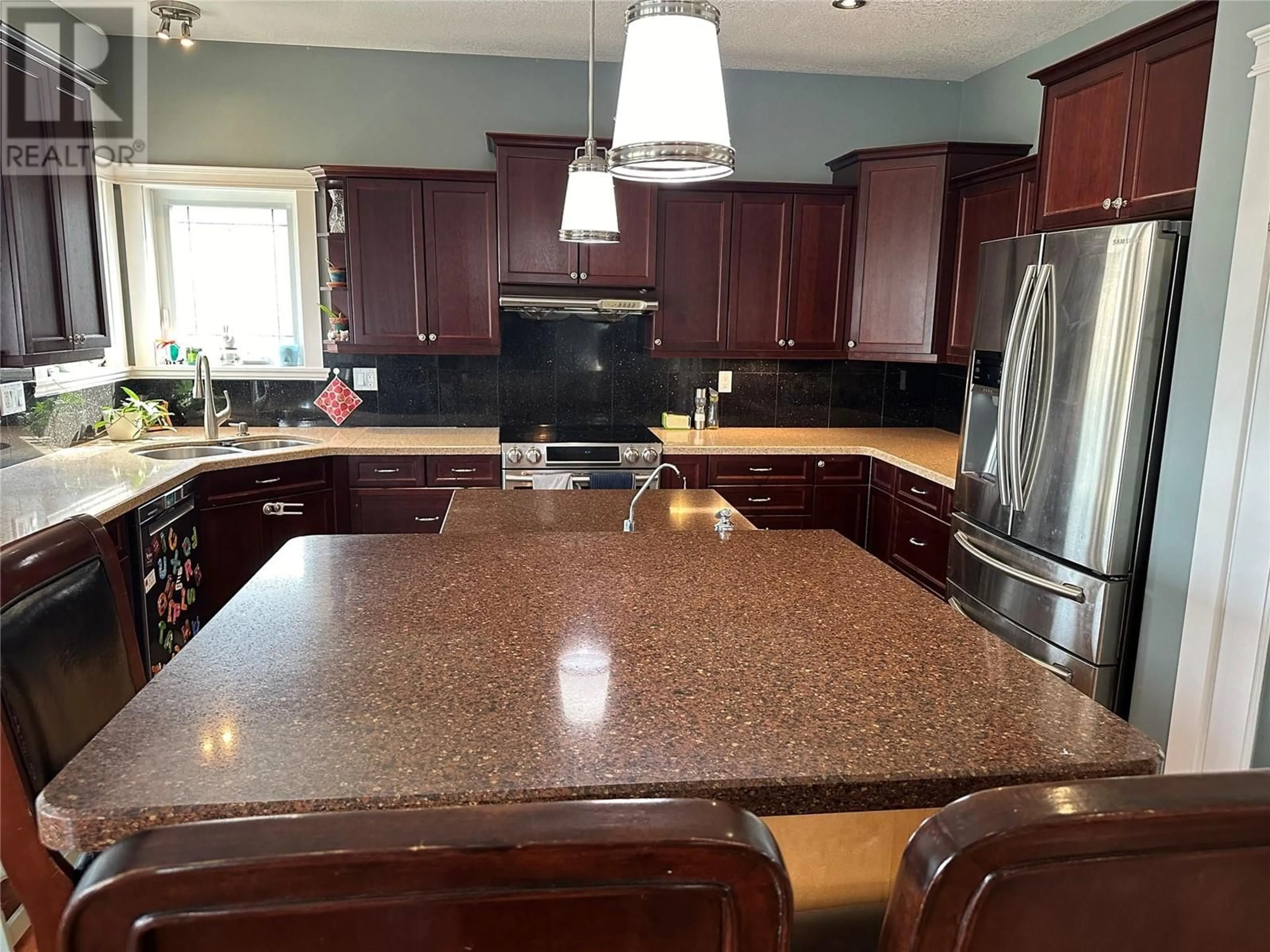 Open concept kitchen, ceramic/tile floor for 1844 88 AVENUE, Dawson Creek British Columbia V1G0A6