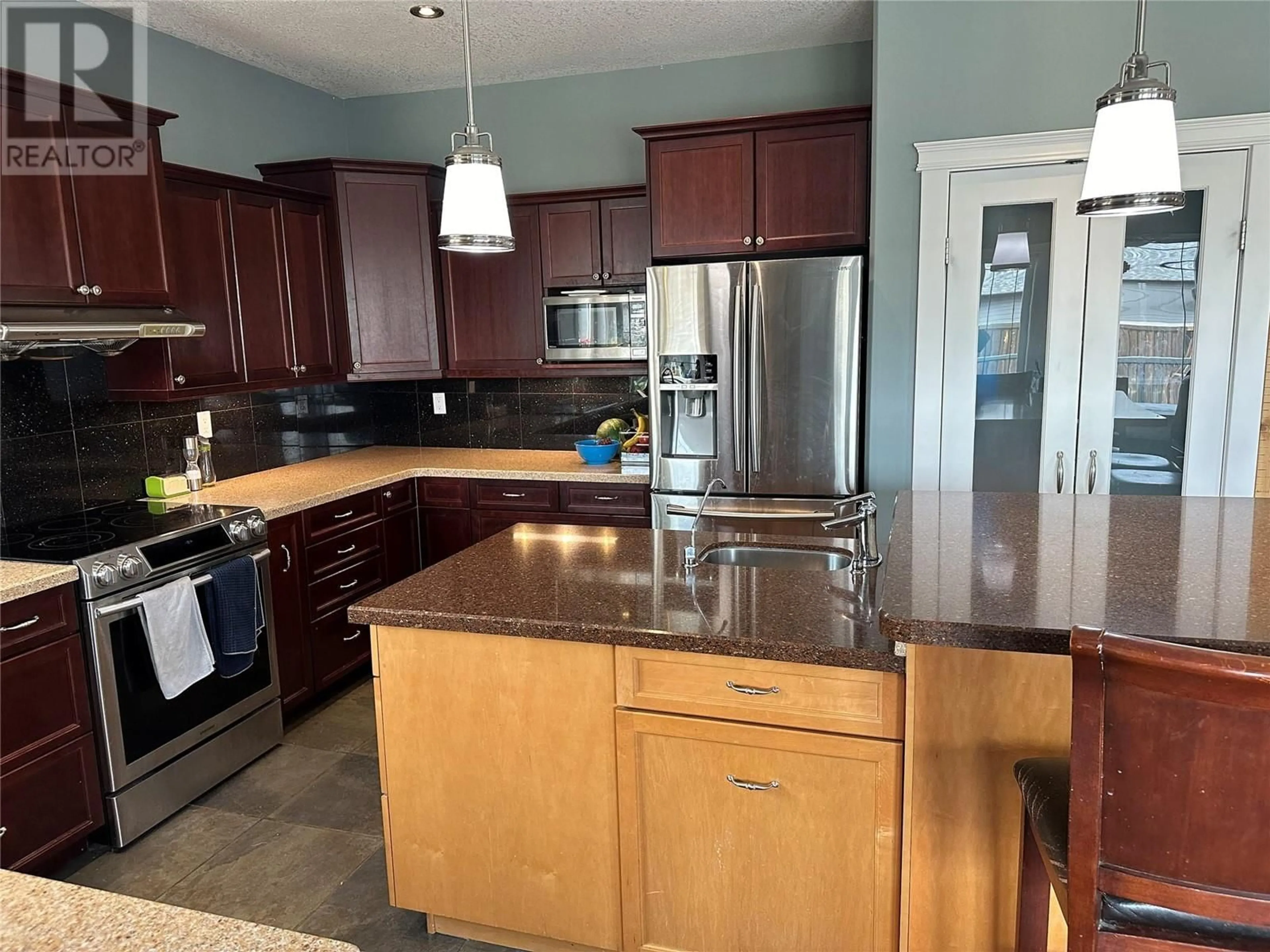Open concept kitchen, unknown for 1844 88 AVENUE, Dawson Creek British Columbia V1G0A6