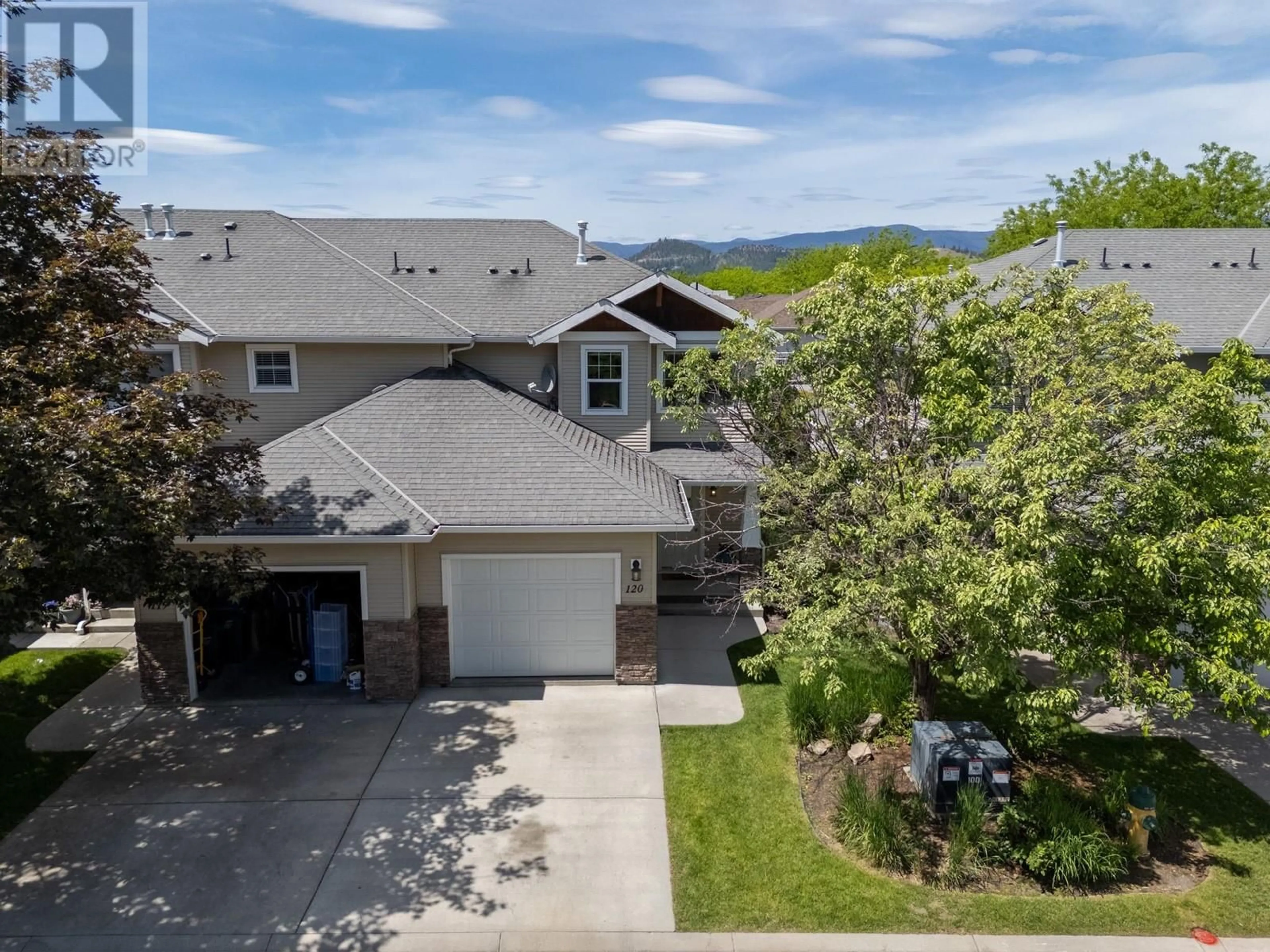 A pic from outside/outdoor area/front of a property/back of a property/a pic from drone, mountain view for 120 - 914 CRAIG ROAD, Kelowna British Columbia V1X7Z7