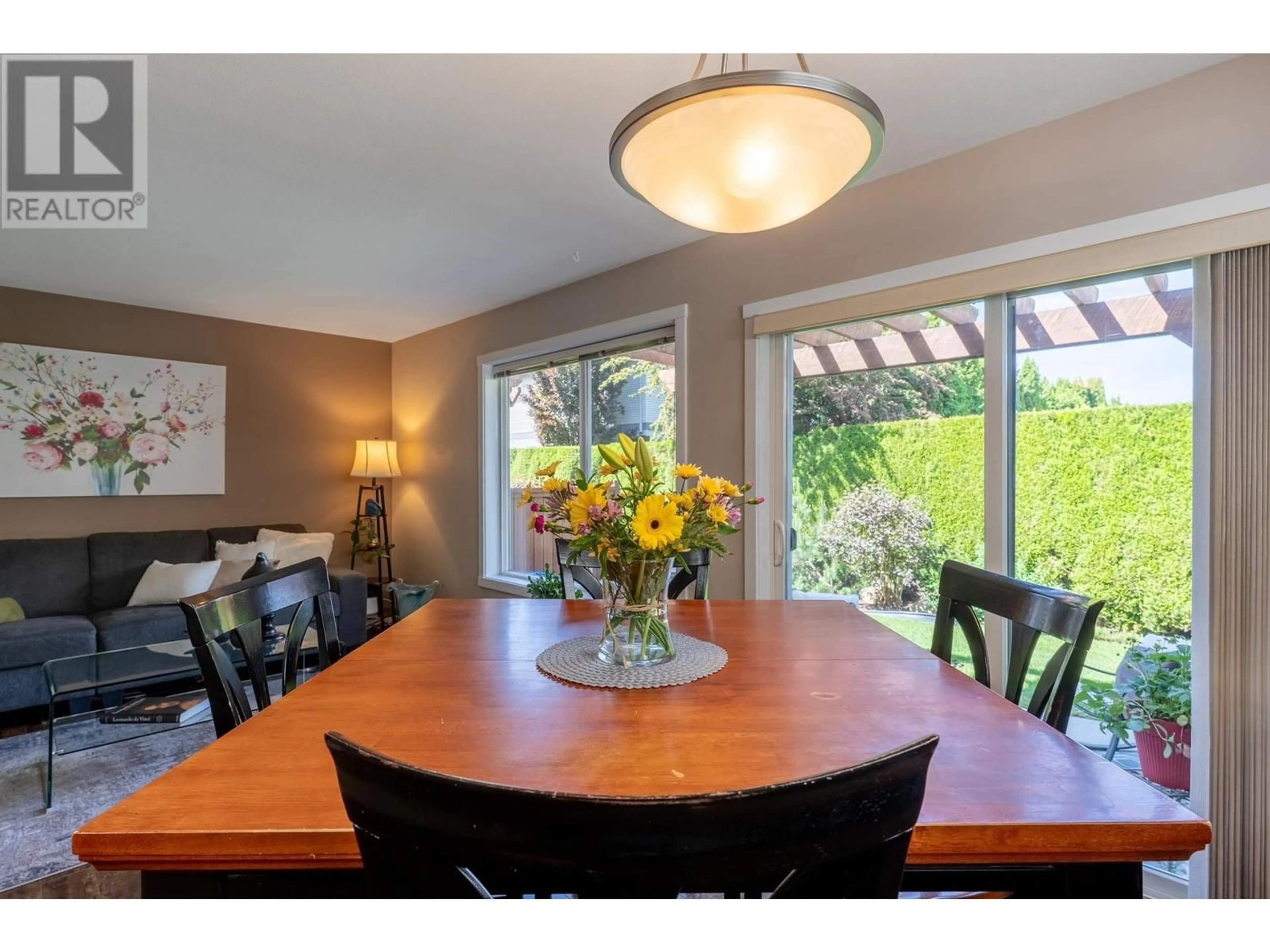 Dining room, wood/laminate floor for 120 - 914 CRAIG ROAD, Kelowna British Columbia V1X7Z7