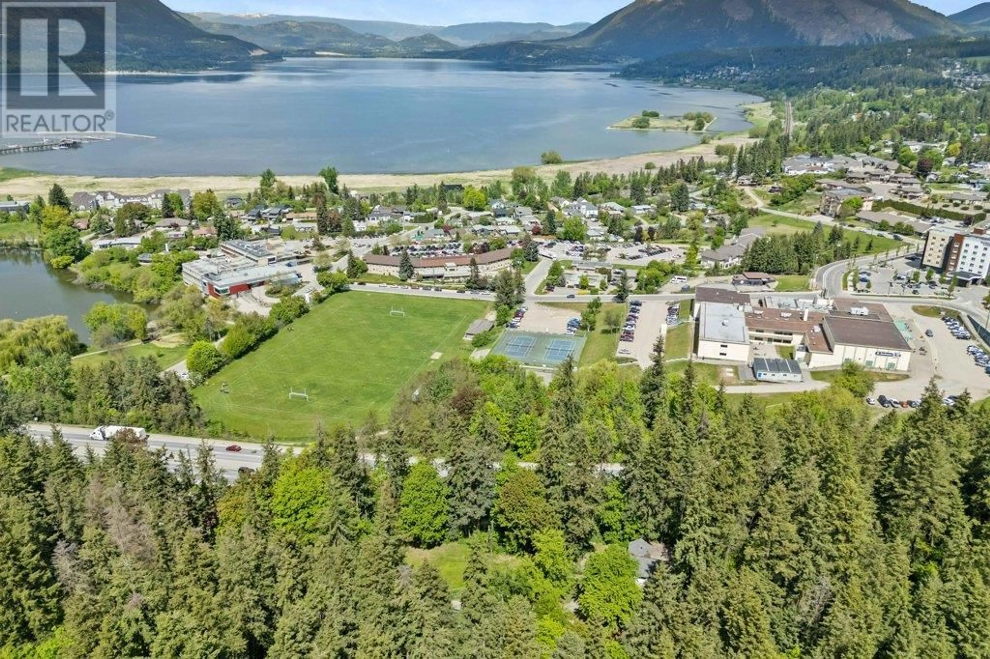 A pic from outside/outdoor area/front of a property/back of a property/a pic from drone, water/lake/river/ocean view for 1210 TRANS CANADA HIGHWAY HIGHWAY NORTHEAST, Salmon Arm British Columbia V1E2S6