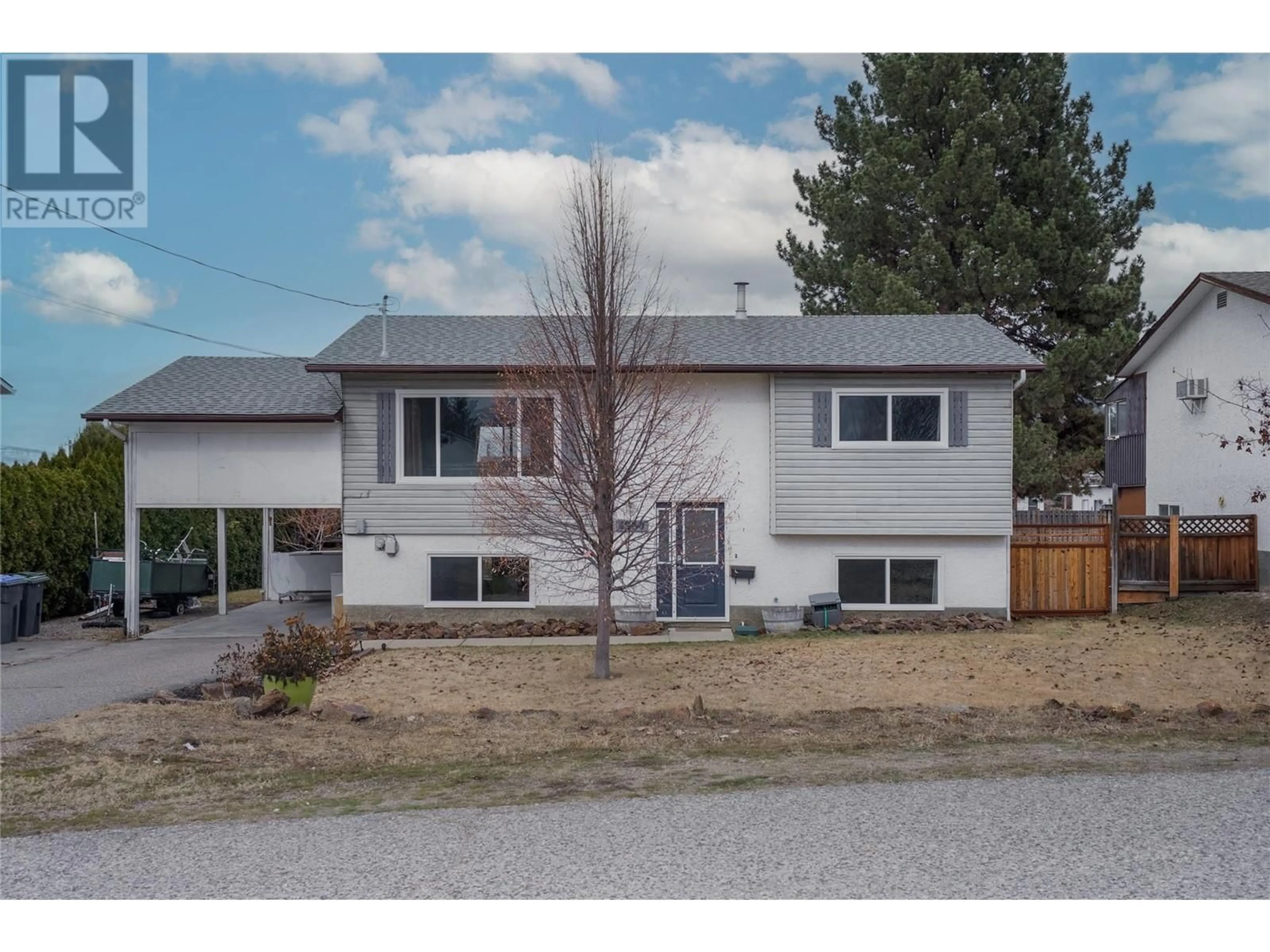 Home with vinyl exterior material, street for 4830 CHATHAM ROAD, Kelowna British Columbia V1X6M4