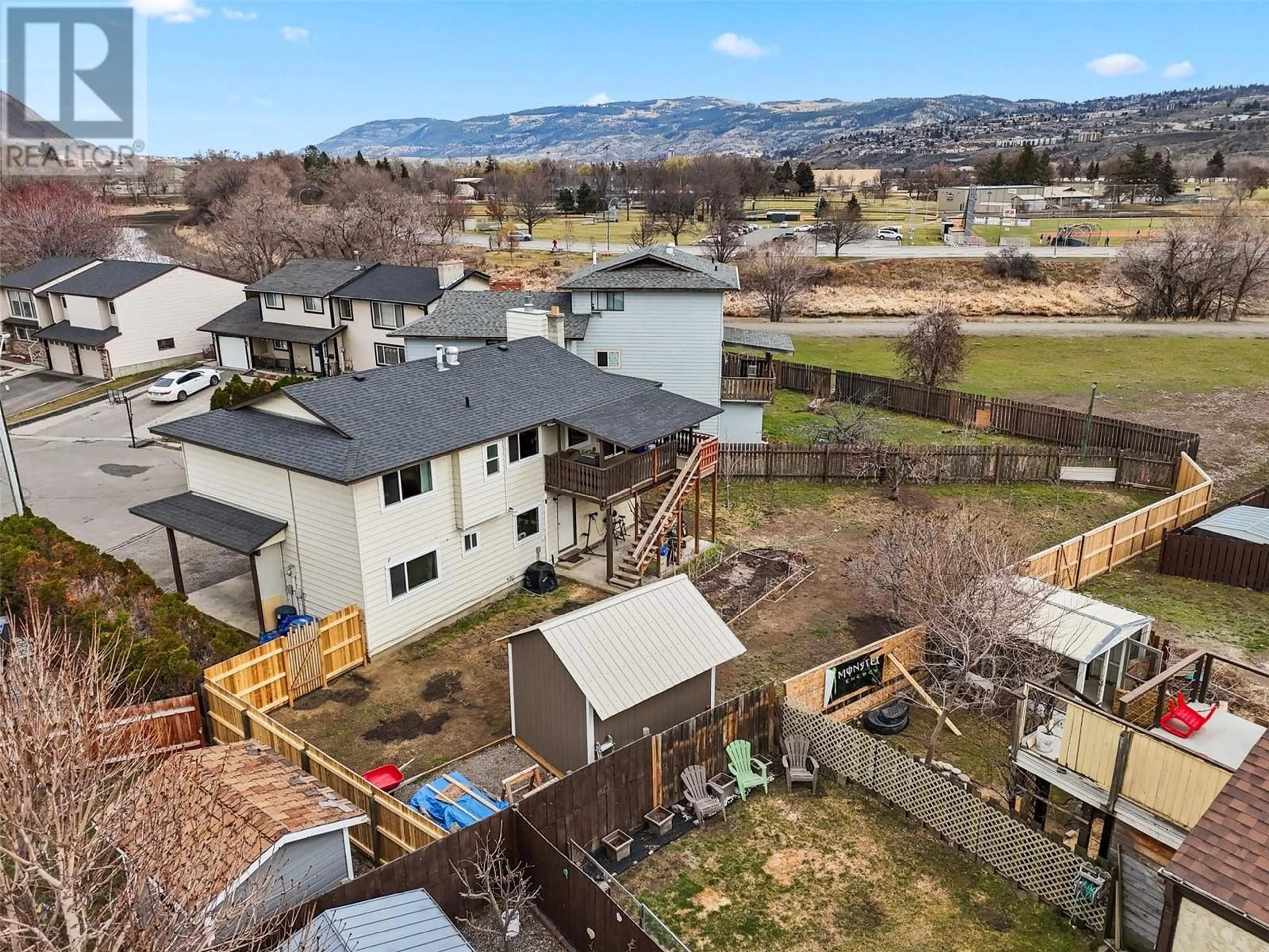 A pic from outside/outdoor area/front of a property/back of a property/a pic from drone, water/lake/river/ocean view for 1447 WATERLOO PLACE, Kamloops British Columbia V2B8G3