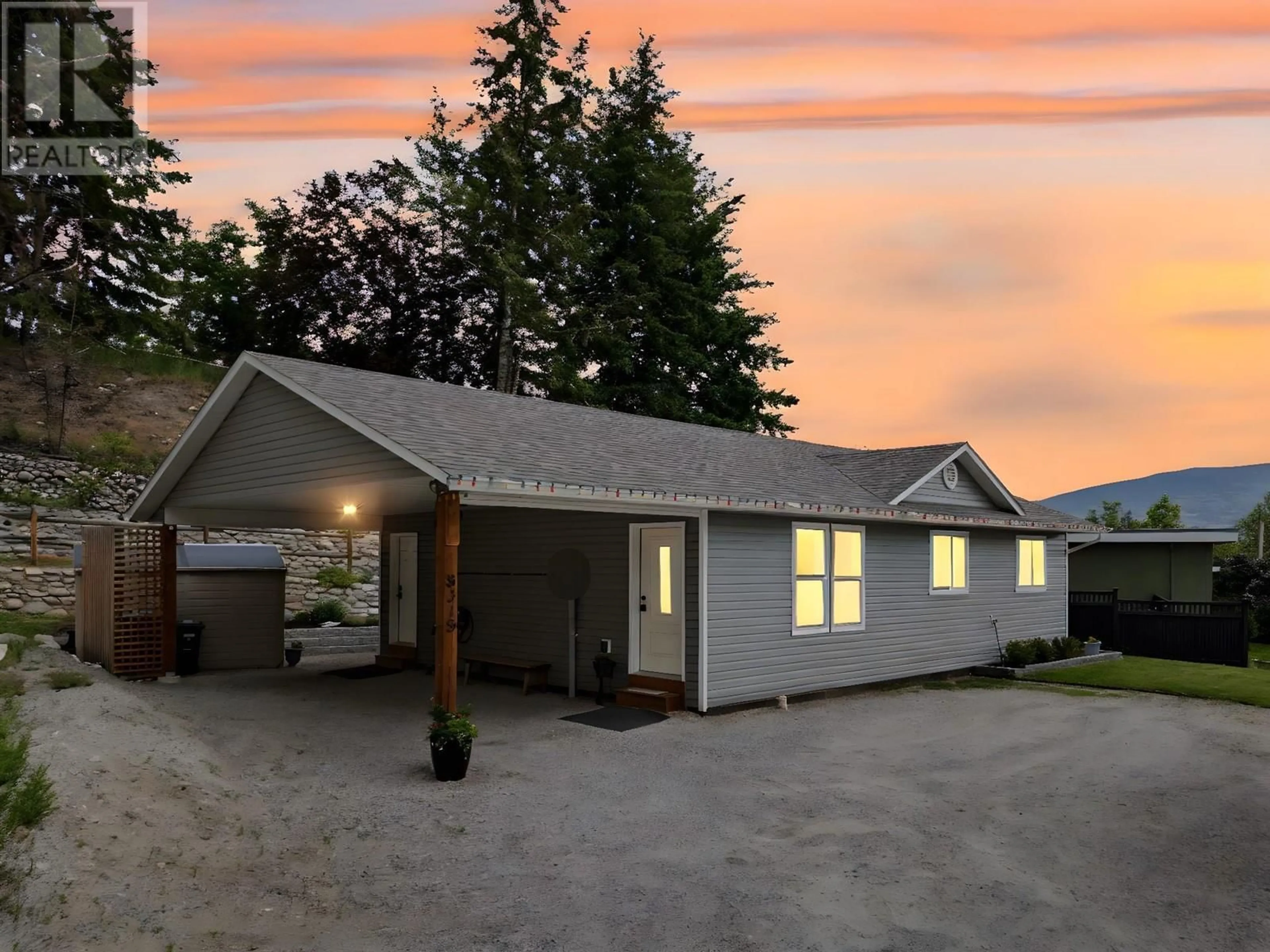 A pic from outside/outdoor area/front of a property/back of a property/a pic from drone, street for 8318 PRAIRIE VALLEY ROAD, Summerland British Columbia V0H1Z4