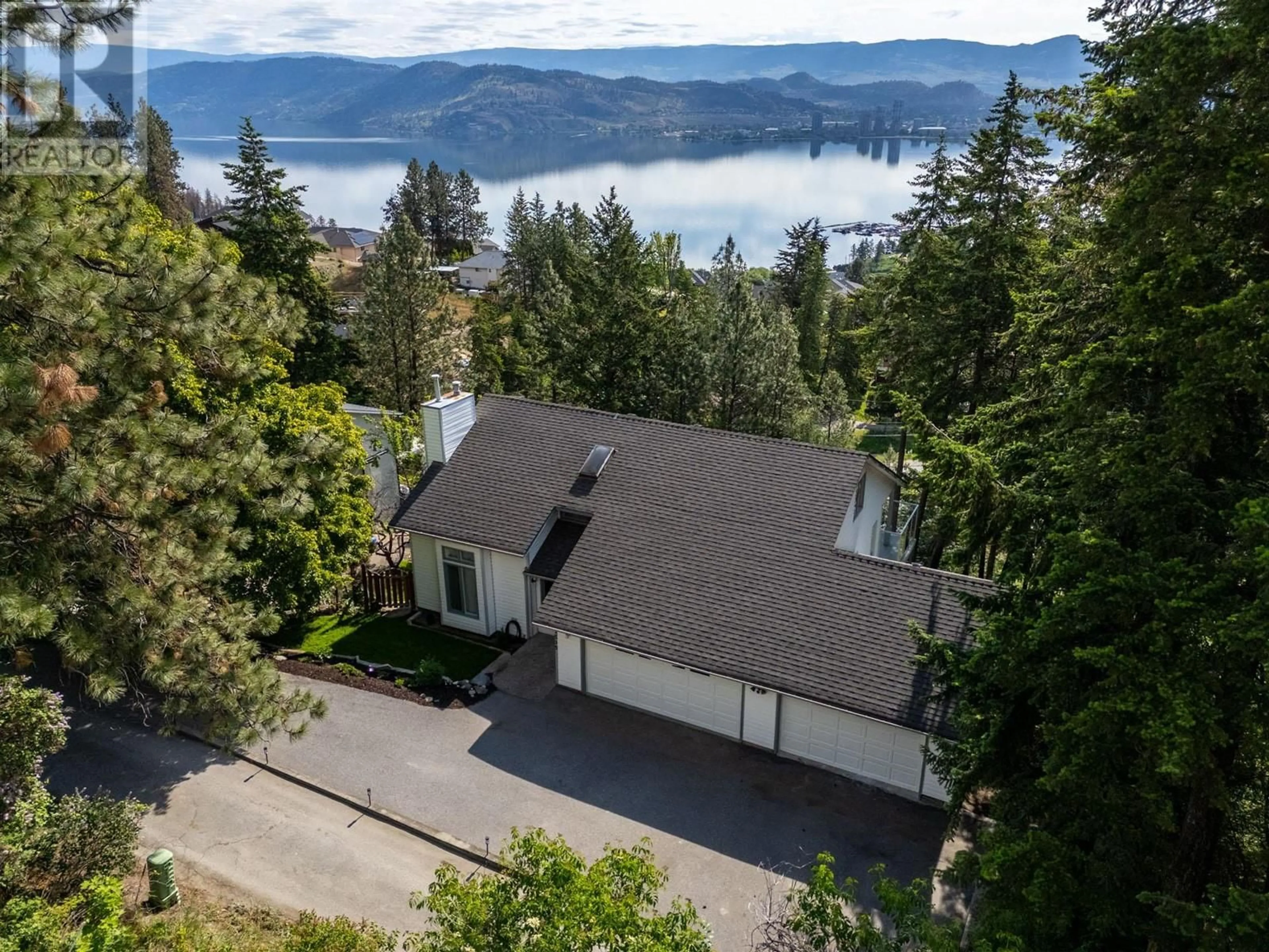 A pic from outside/outdoor area/front of a property/back of a property/a pic from drone, water/lake/river/ocean view for 1515 SCOTT CRESCENT, West Kelowna British Columbia V1Z2X6