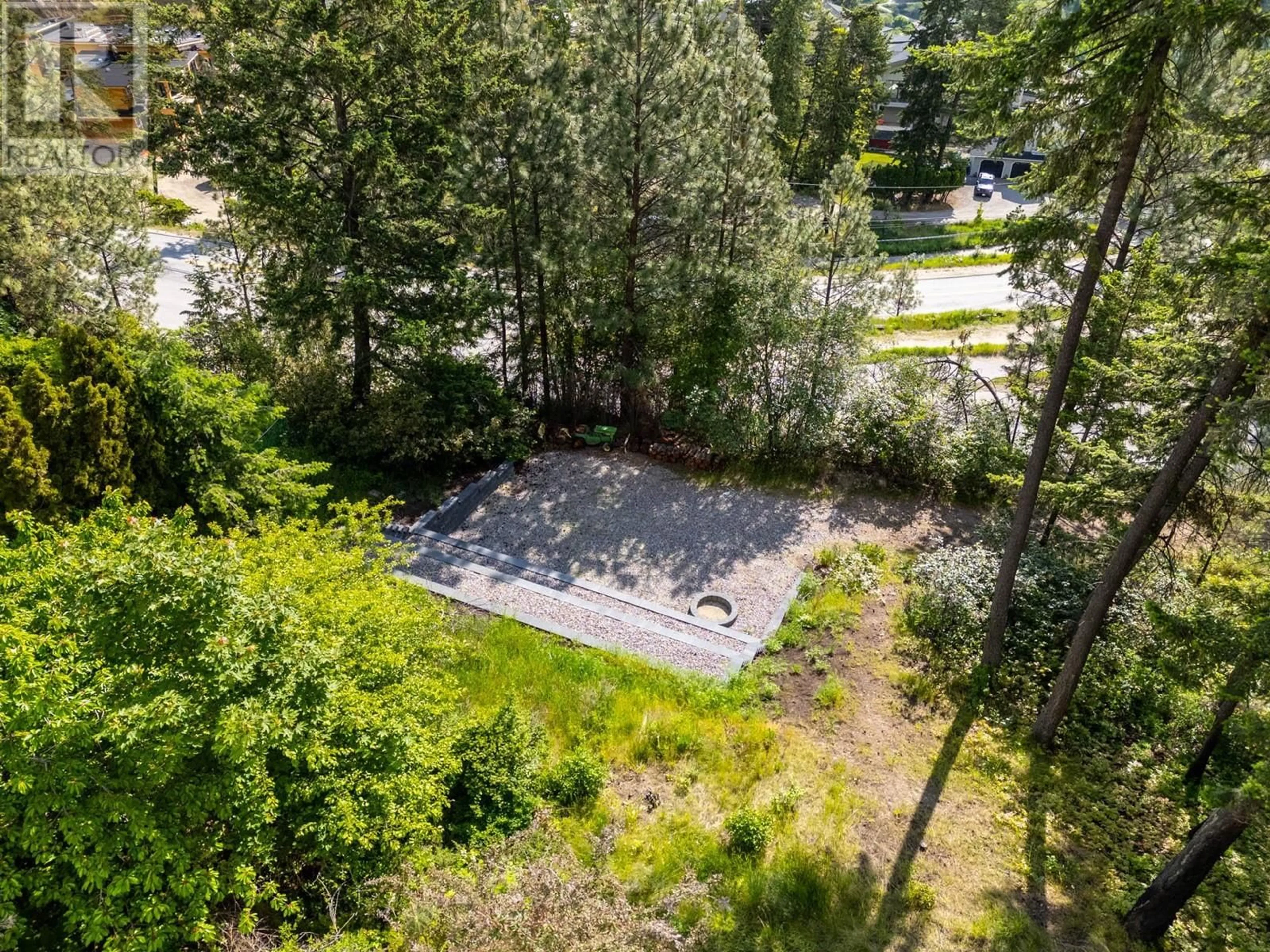 A pic from outside/outdoor area/front of a property/back of a property/a pic from drone, forest/trees view for 1515 SCOTT CRESCENT, West Kelowna British Columbia V1Z2X6