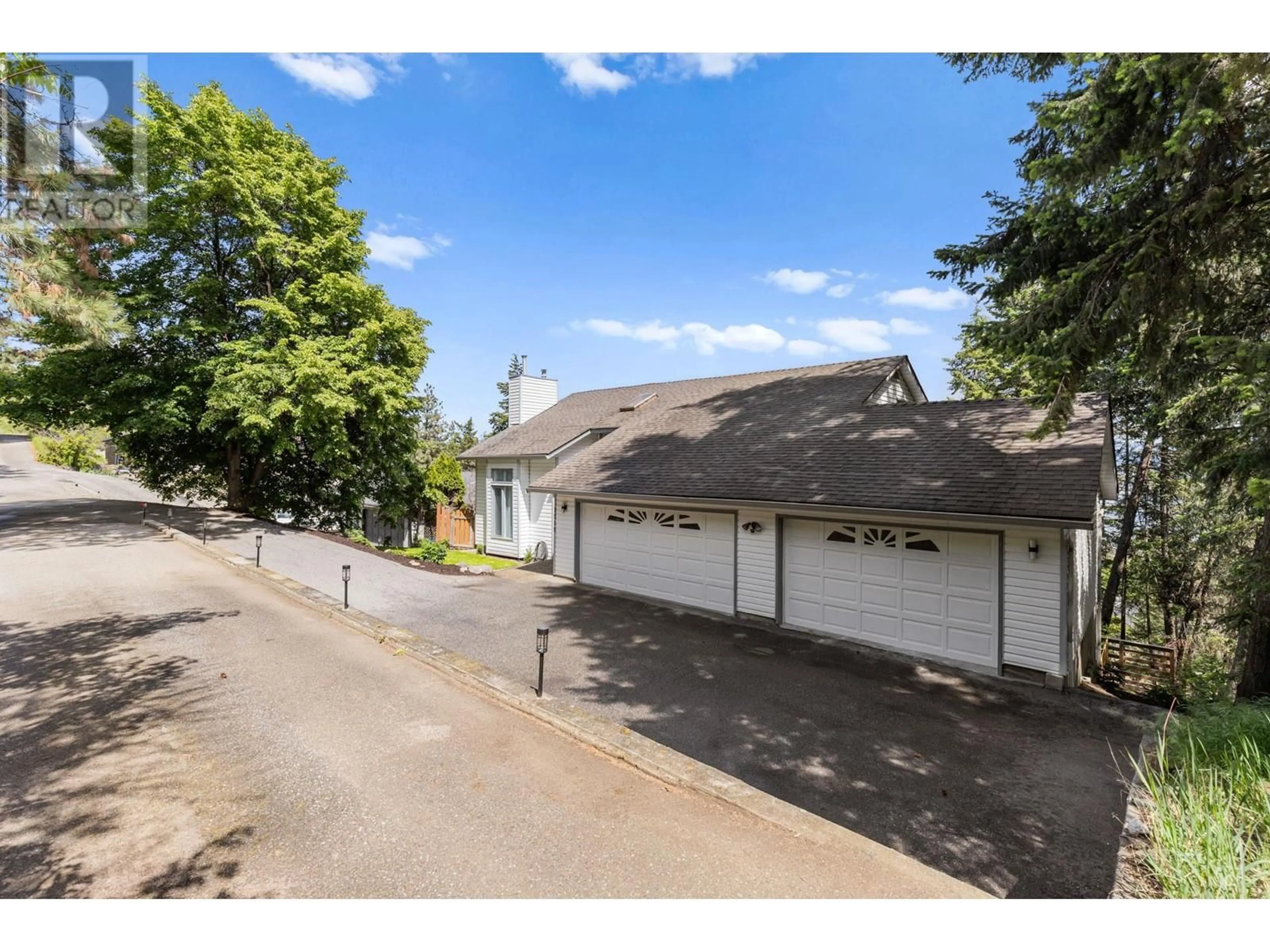 A pic from outside/outdoor area/front of a property/back of a property/a pic from drone, street for 1515 SCOTT CRESCENT, West Kelowna British Columbia V1Z2X6
