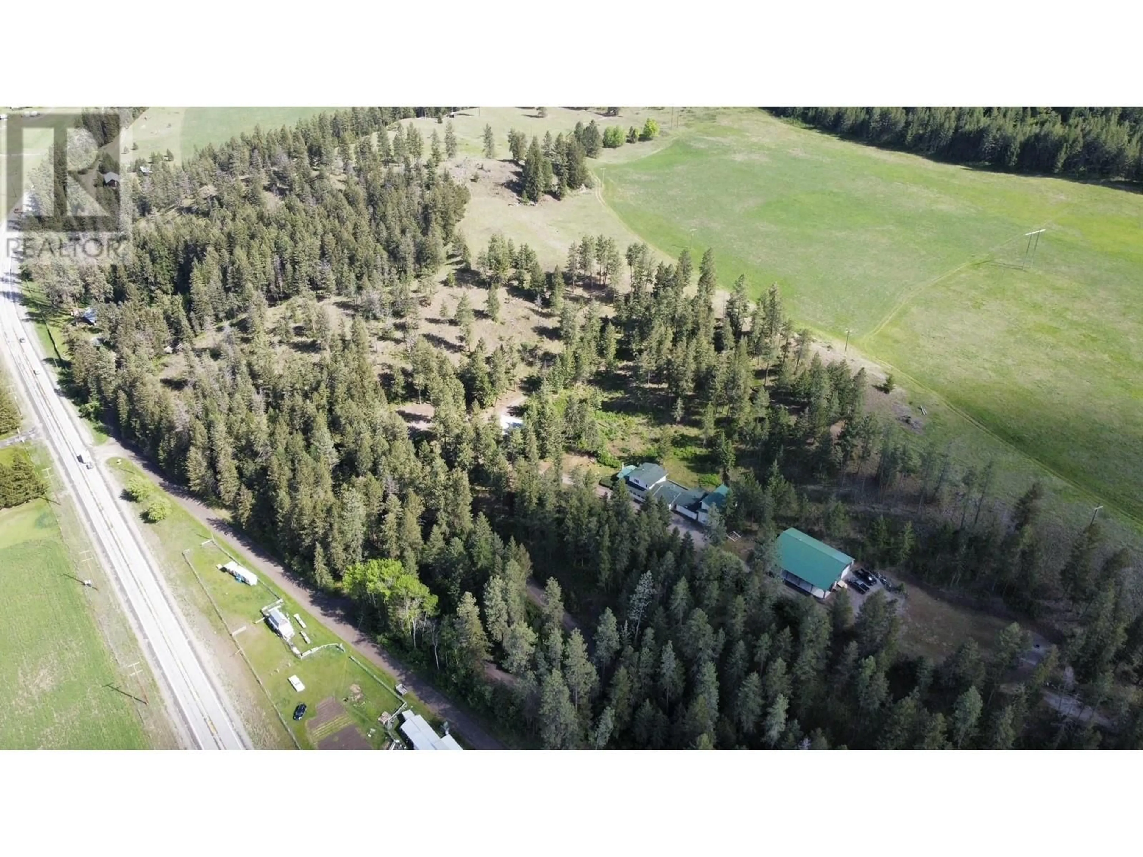 A pic from outside/outdoor area/front of a property/back of a property/a pic from drone, forest/trees view for 3400 HWY 3 HIGHWAY, Rock Creek British Columbia V0H1Y0