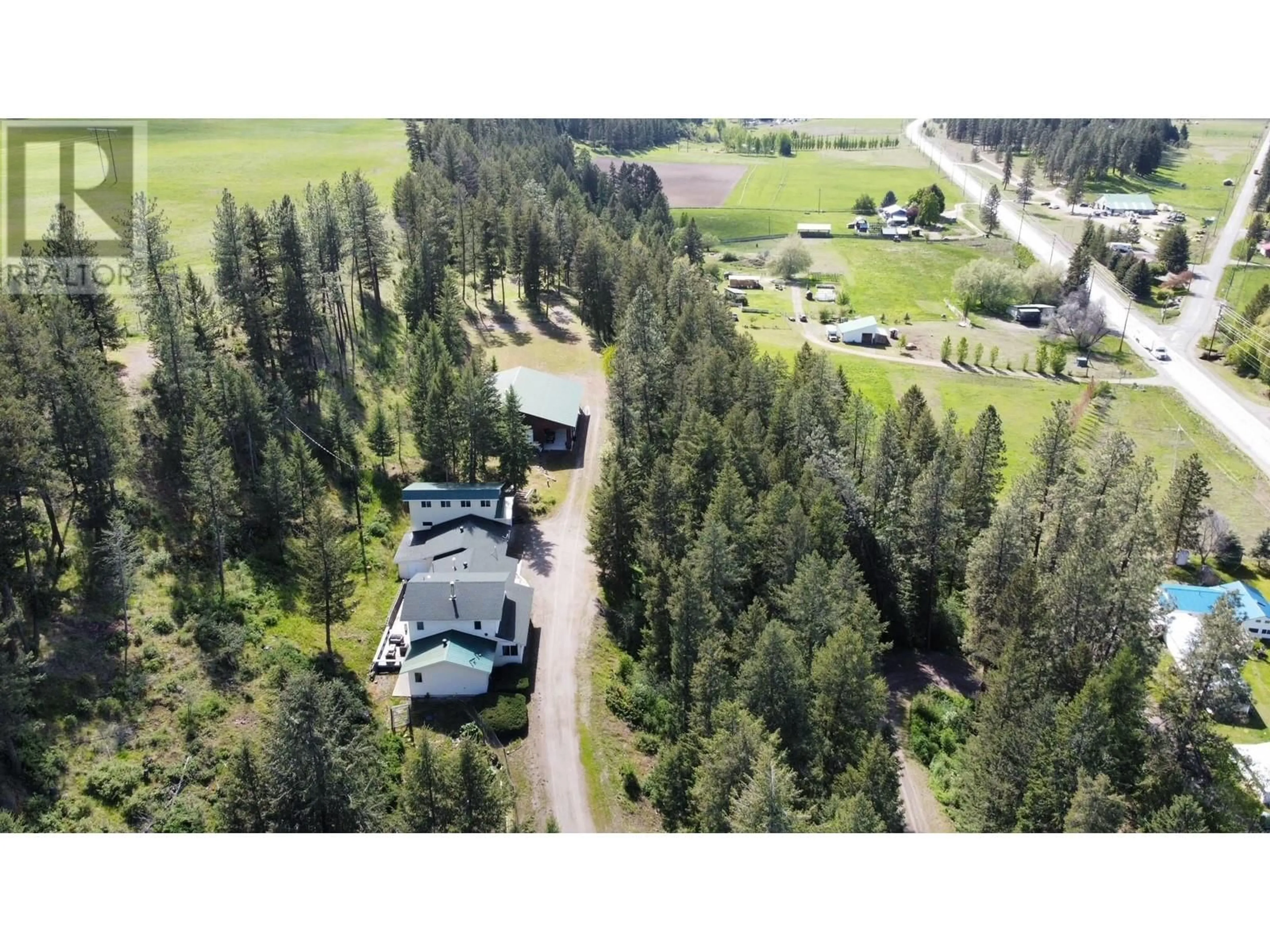 A pic from outside/outdoor area/front of a property/back of a property/a pic from drone, forest/trees view for 3400 HWY 3 HIGHWAY, Rock Creek British Columbia V0H1Y0