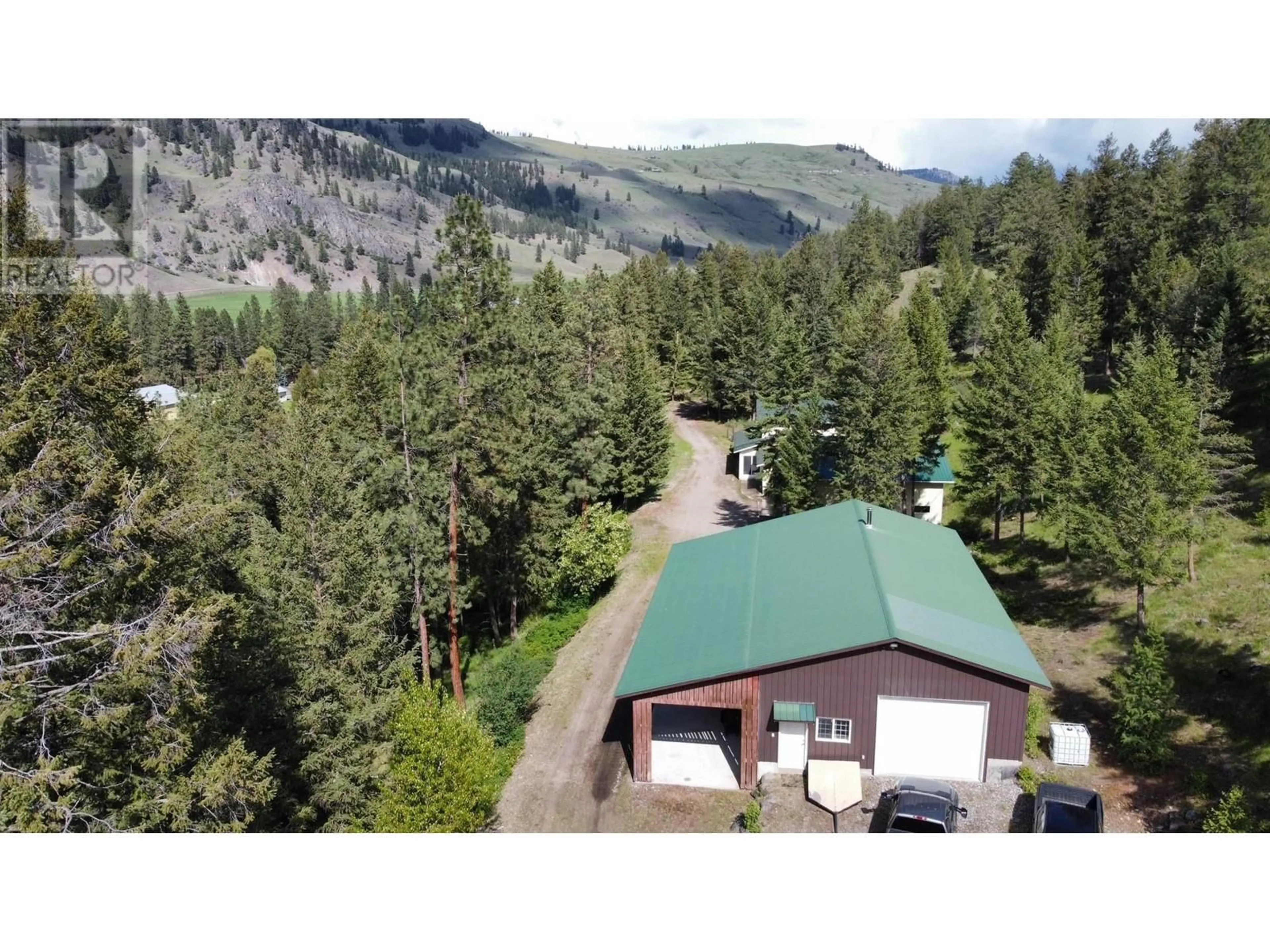 A pic from outside/outdoor area/front of a property/back of a property/a pic from drone, mountain view for 3400 HWY 3 HIGHWAY, Rock Creek British Columbia V0H1Y0