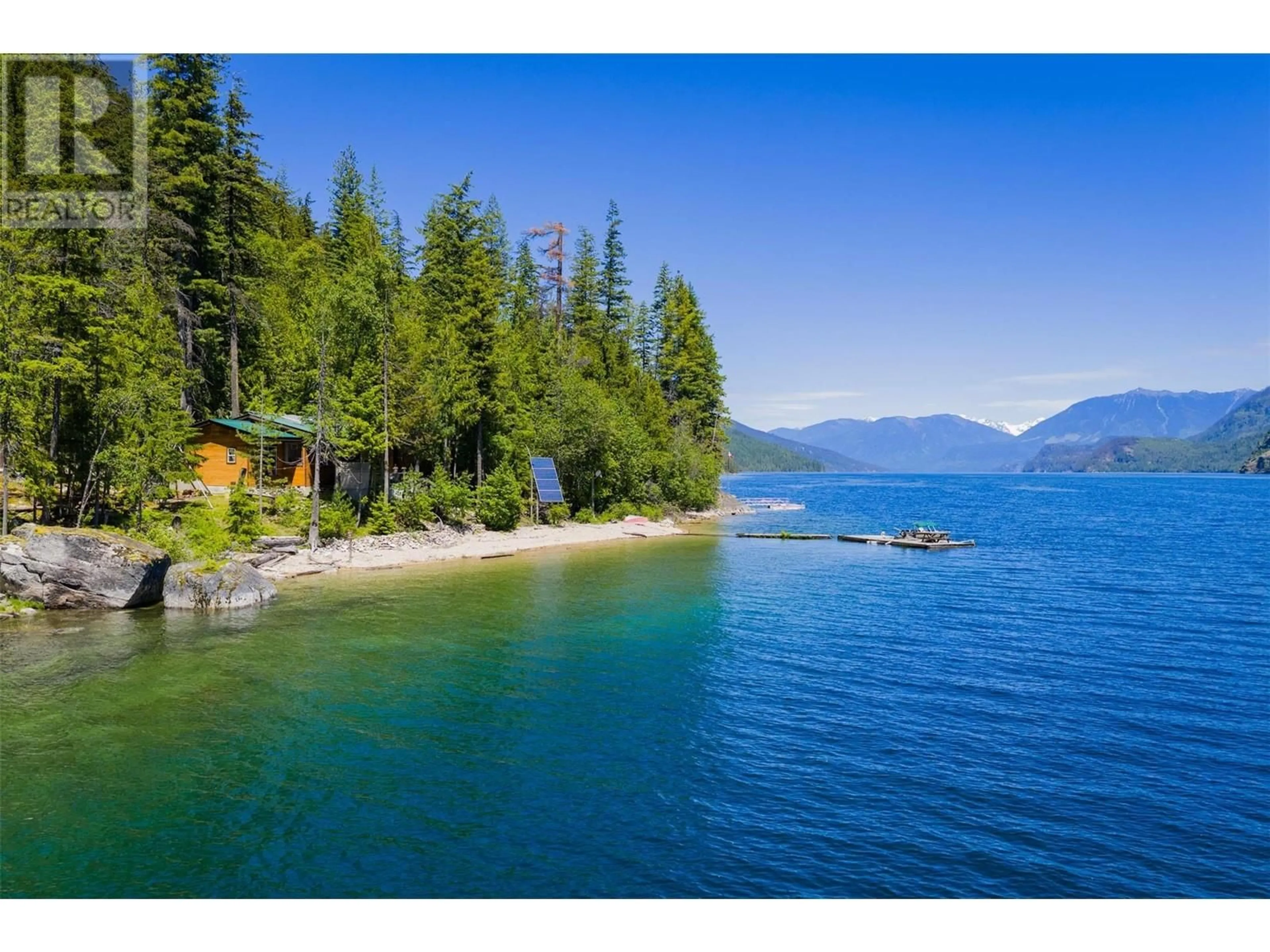 A pic from outside/outdoor area/front of a property/back of a property/a pic from drone, water/lake/river/ocean view for 9557 SLOCAN LAKE OTHER, Slocan British Columbia V0G2C0