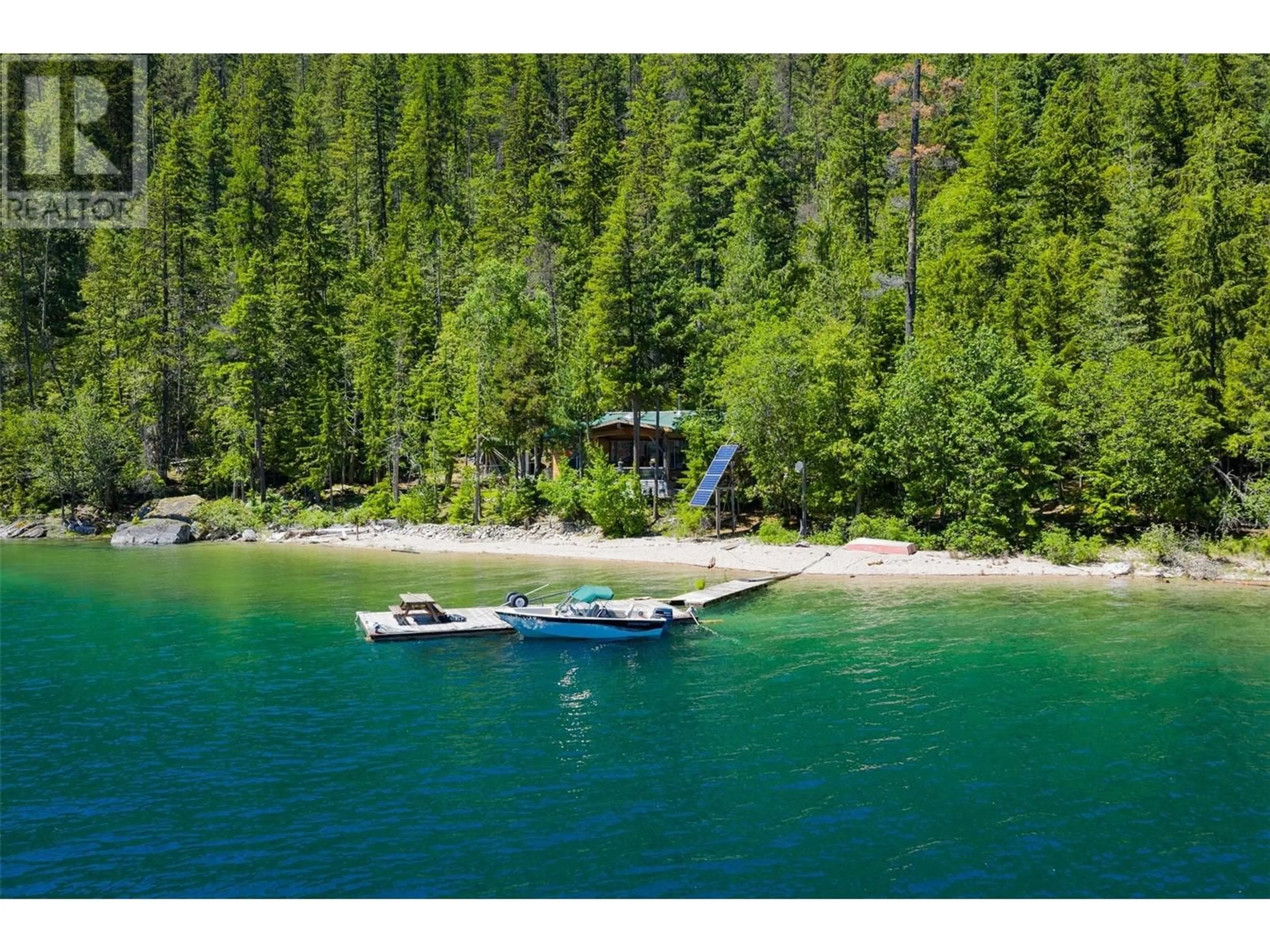 A pic from outside/outdoor area/front of a property/back of a property/a pic from drone, water/lake/river/ocean view for 9557 SLOCAN LAKE OTHER, Slocan British Columbia V0G2C0