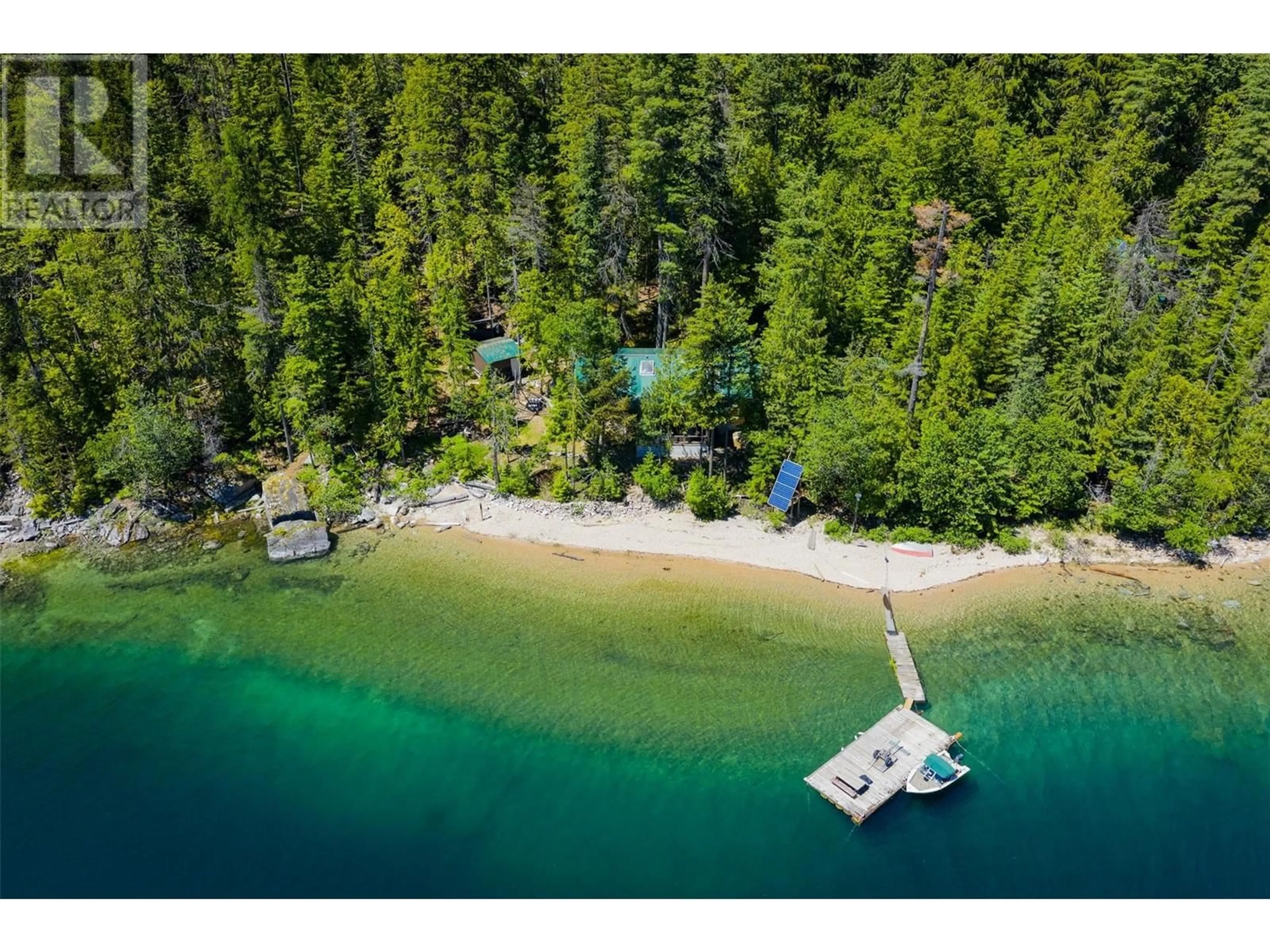 A pic from outside/outdoor area/front of a property/back of a property/a pic from drone, water/lake/river/ocean view for 9557 SLOCAN LAKE OTHER, Slocan British Columbia V0G2C0
