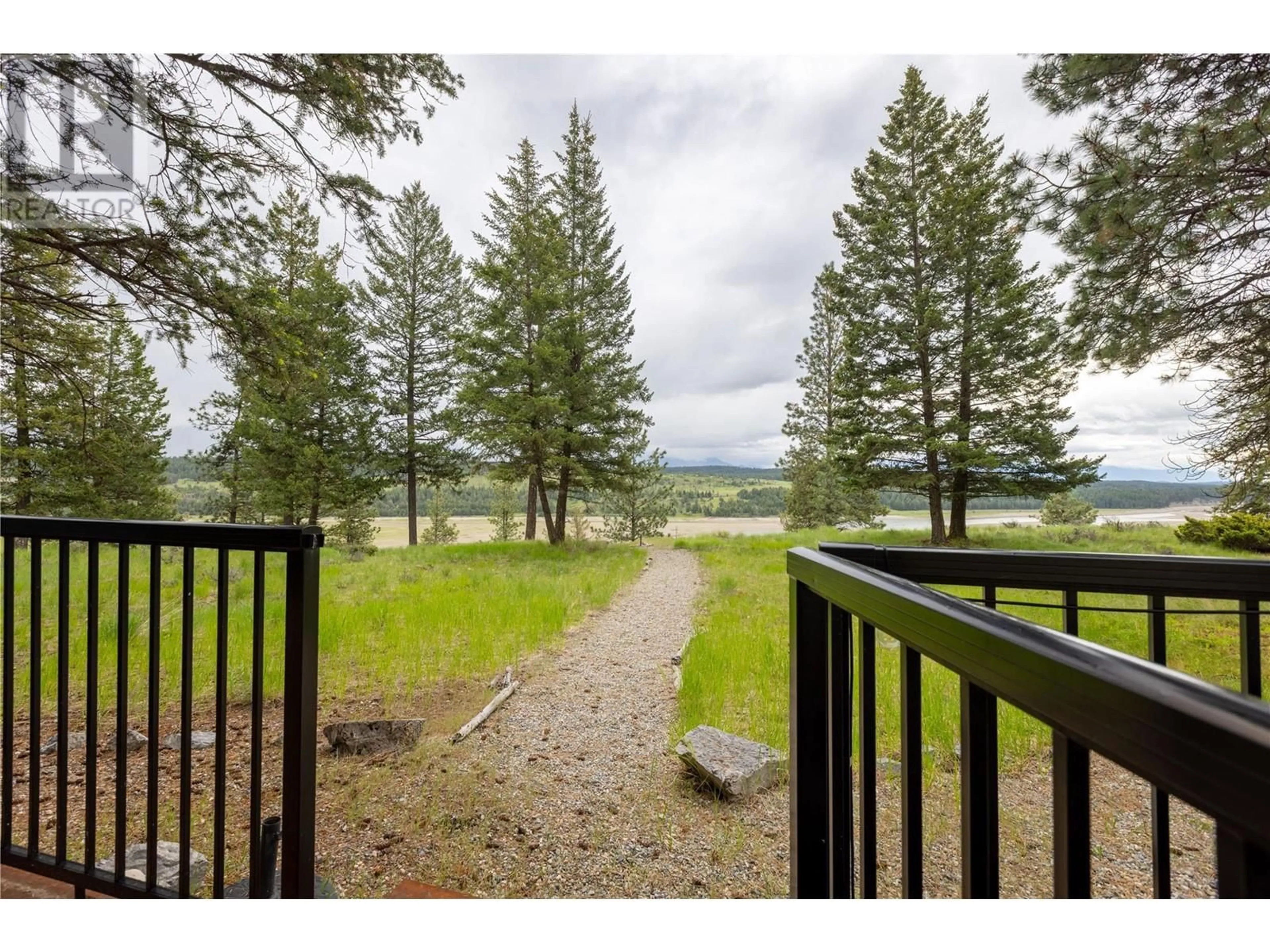 A pic from outside/outdoor area/front of a property/back of a property/a pic from drone, forest/trees view for 30 - 6674 WARDNER-KIKOMUN ROAD, Wardner British Columbia V0B2J0