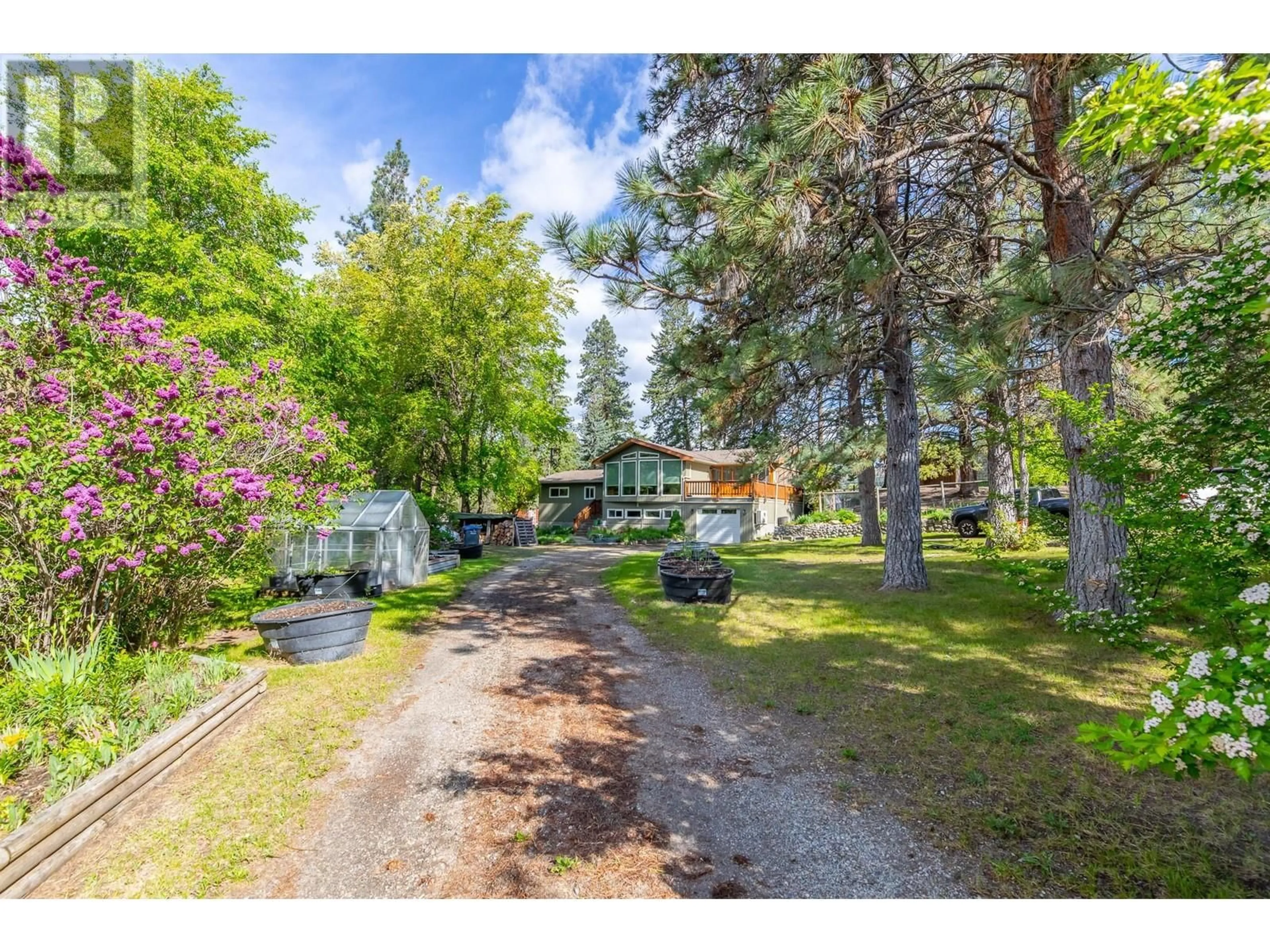A pic from outside/outdoor area/front of a property/back of a property/a pic from drone, forest/trees view for 12018 GALLAUGHER STREET, Summerland British Columbia V0H1Z3
