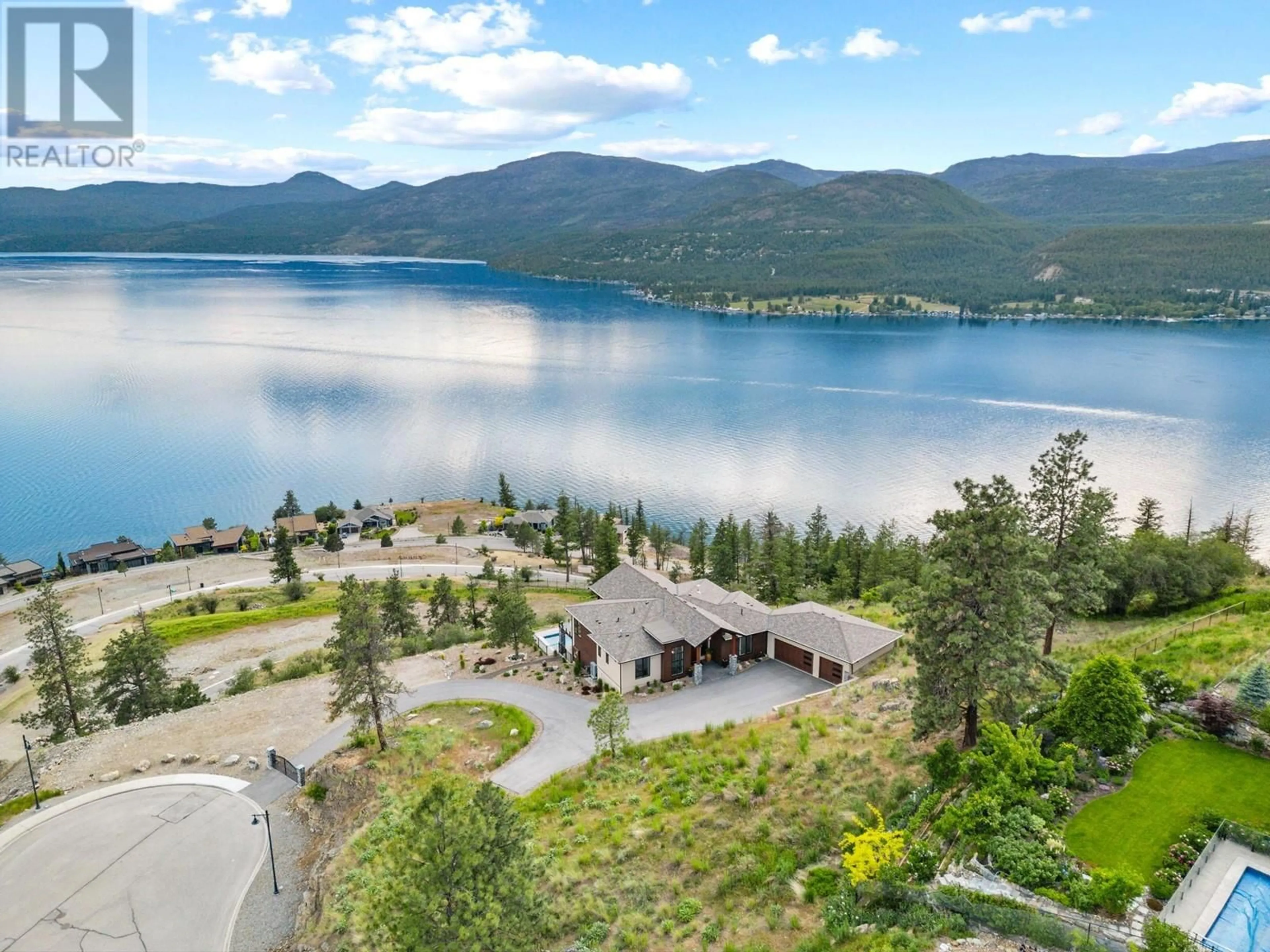 A pic from outside/outdoor area/front of a property/back of a property/a pic from drone, water/lake/river/ocean view for 8836 STONINGTON ROAD, Vernon British Columbia V1H2K8