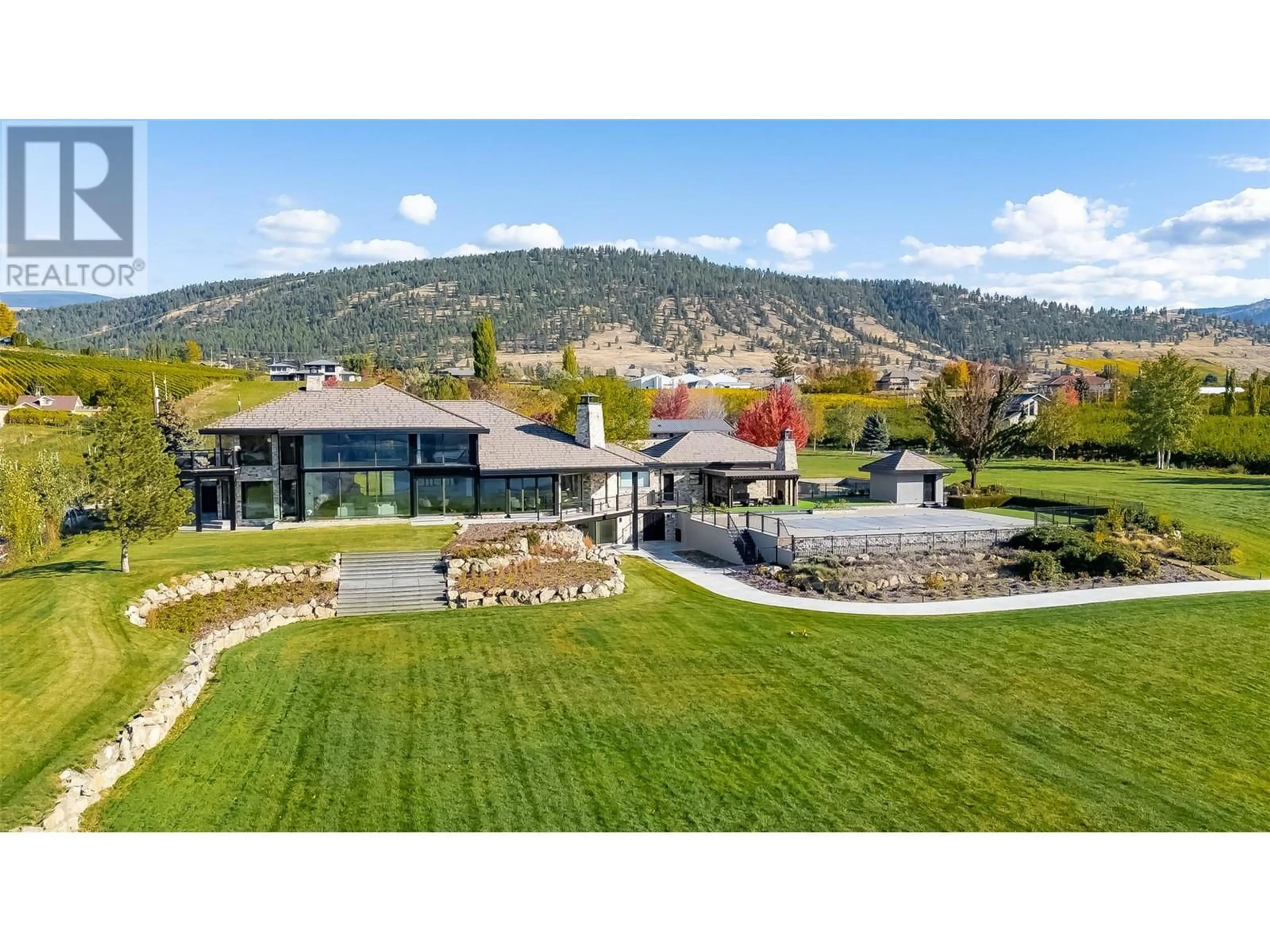 A pic from outside/outdoor area/front of a property/back of a property/a pic from drone, mountain view for 345 LOWER BENCH ROAD, Penticton British Columbia V2A8V4