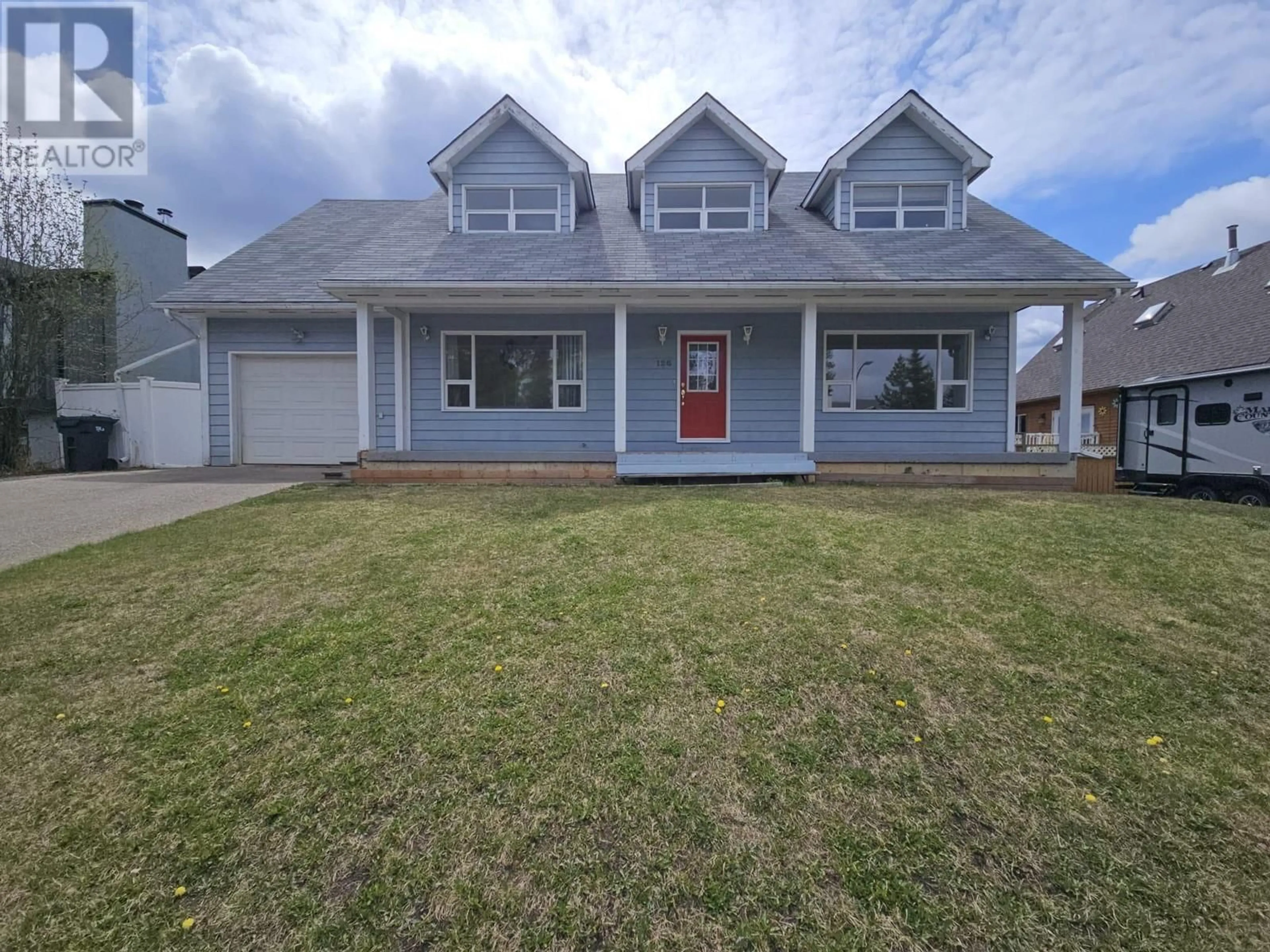 Home with vinyl exterior material, street for 128 CHAMBERLAIN CRESCENT, Tumbler Ridge British Columbia V0C2W0