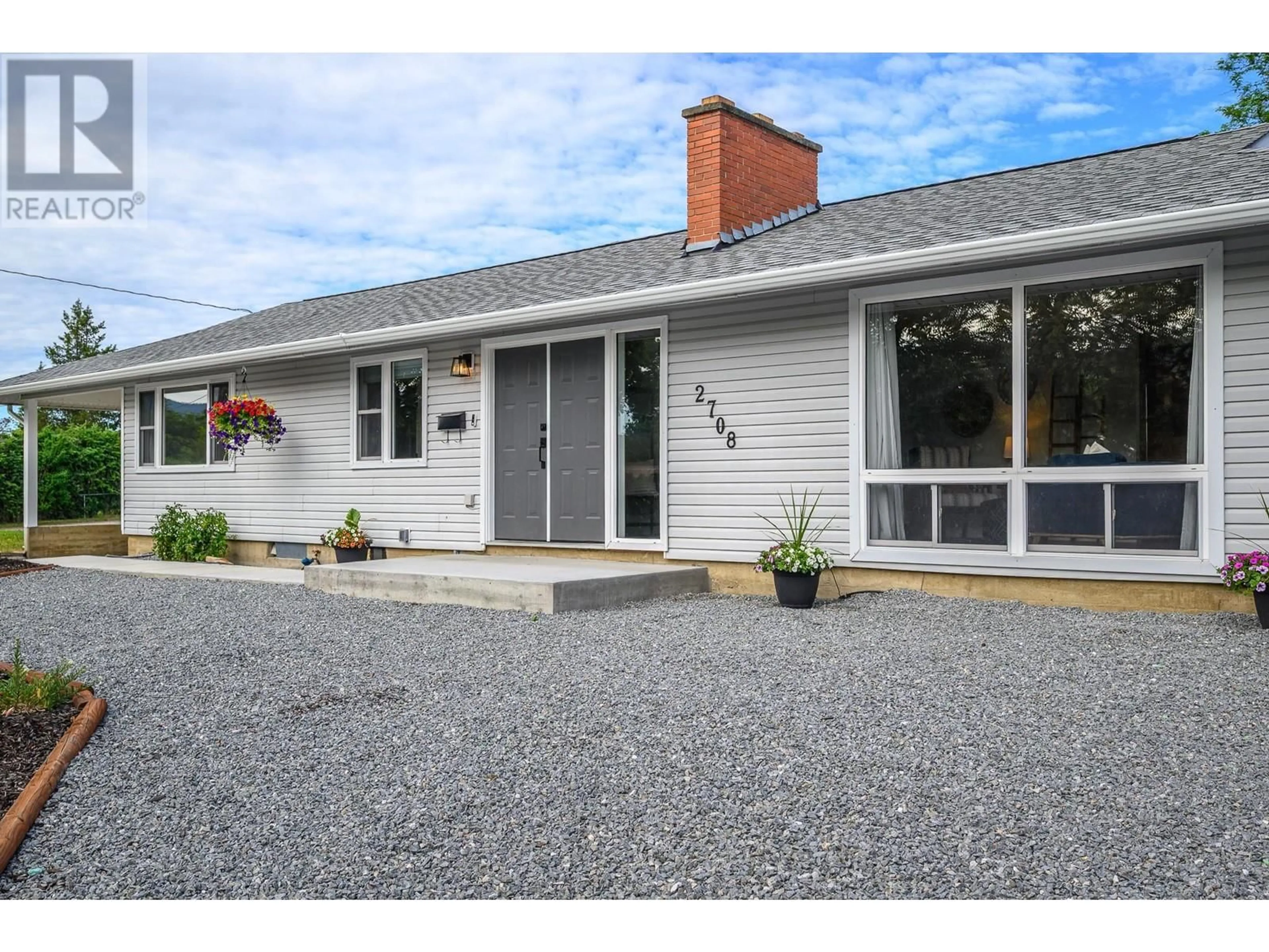 Home with vinyl exterior material, street for 2708 18TH STREET, Vernon British Columbia V1T4A4