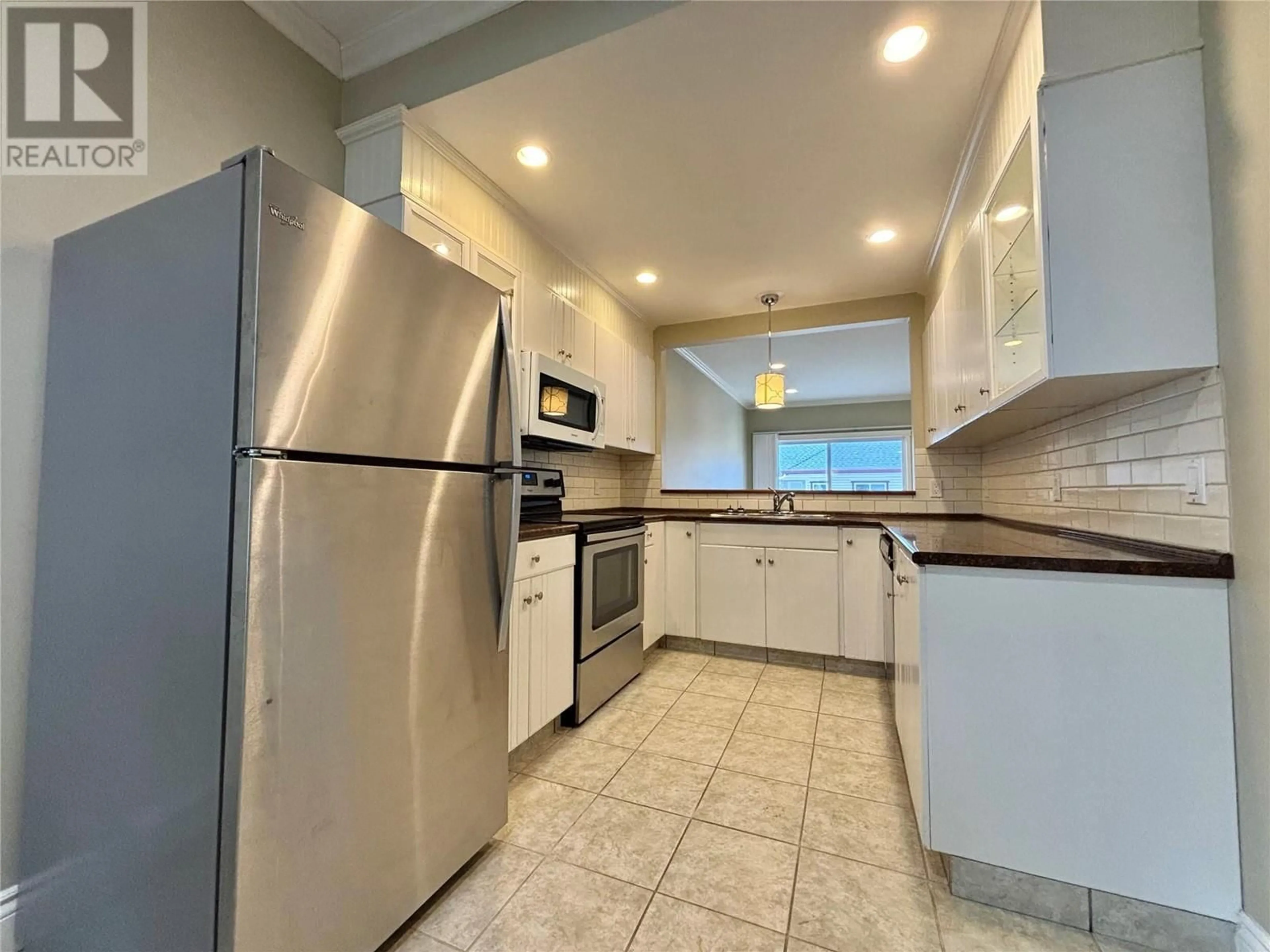 Standard kitchen, ceramic/tile floor for 13 - 4800 HERITAGE DRIVE, Vernon British Columbia V1T7V4