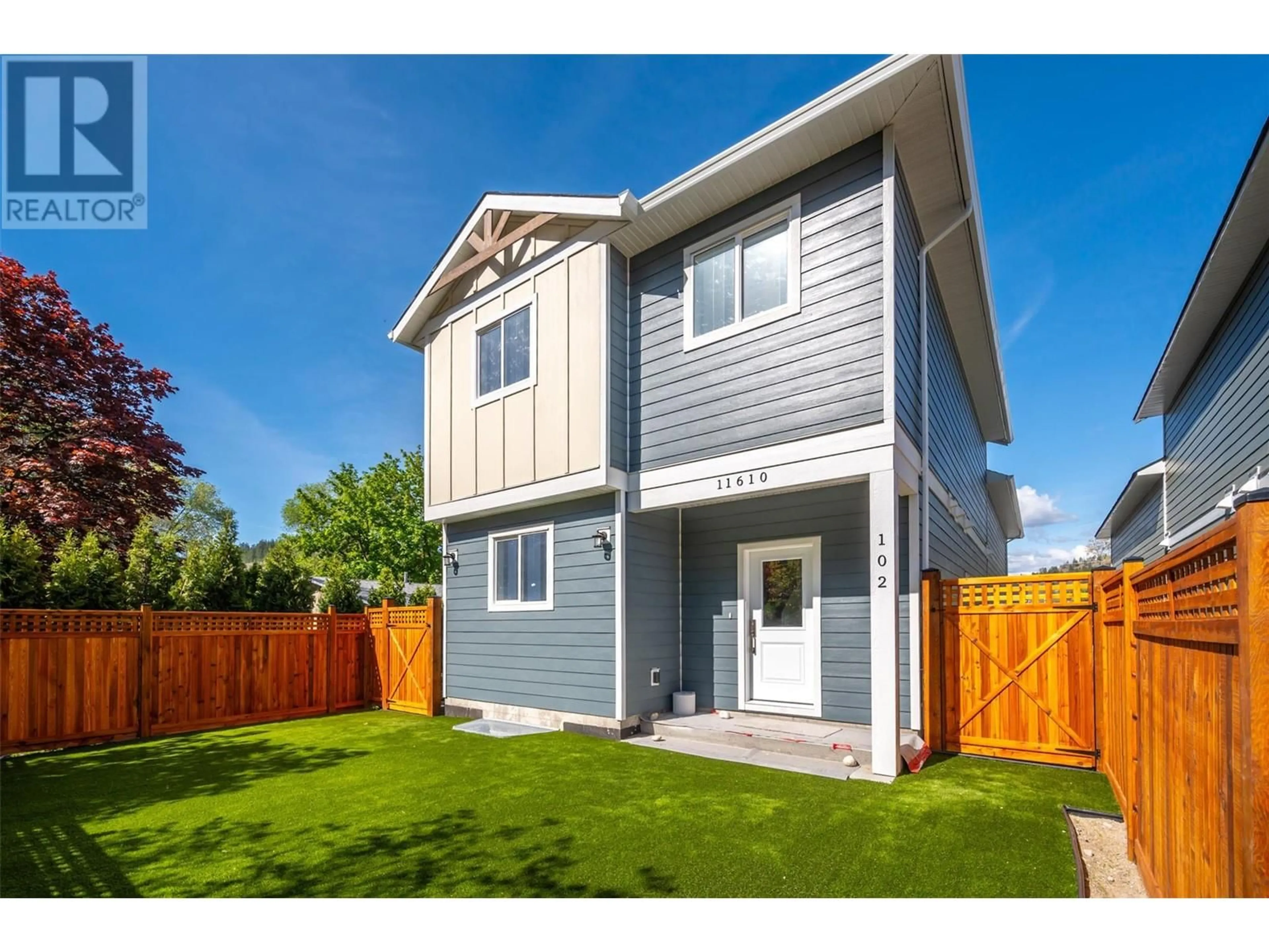 Home with vinyl exterior material, street for 102 - 11610 VICTORIA ROAD SOUTH, Summerland British Columbia V0H1Z2
